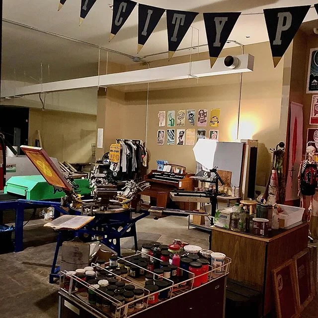 The shirt printing area is feeling cozy these days 🌨 Open Studio this month will be held on Friday the 20th from 11 to 7 pm! Come through to see member work and some live printing in our space #openstudio #anchorage #printmaking #independentprintstu