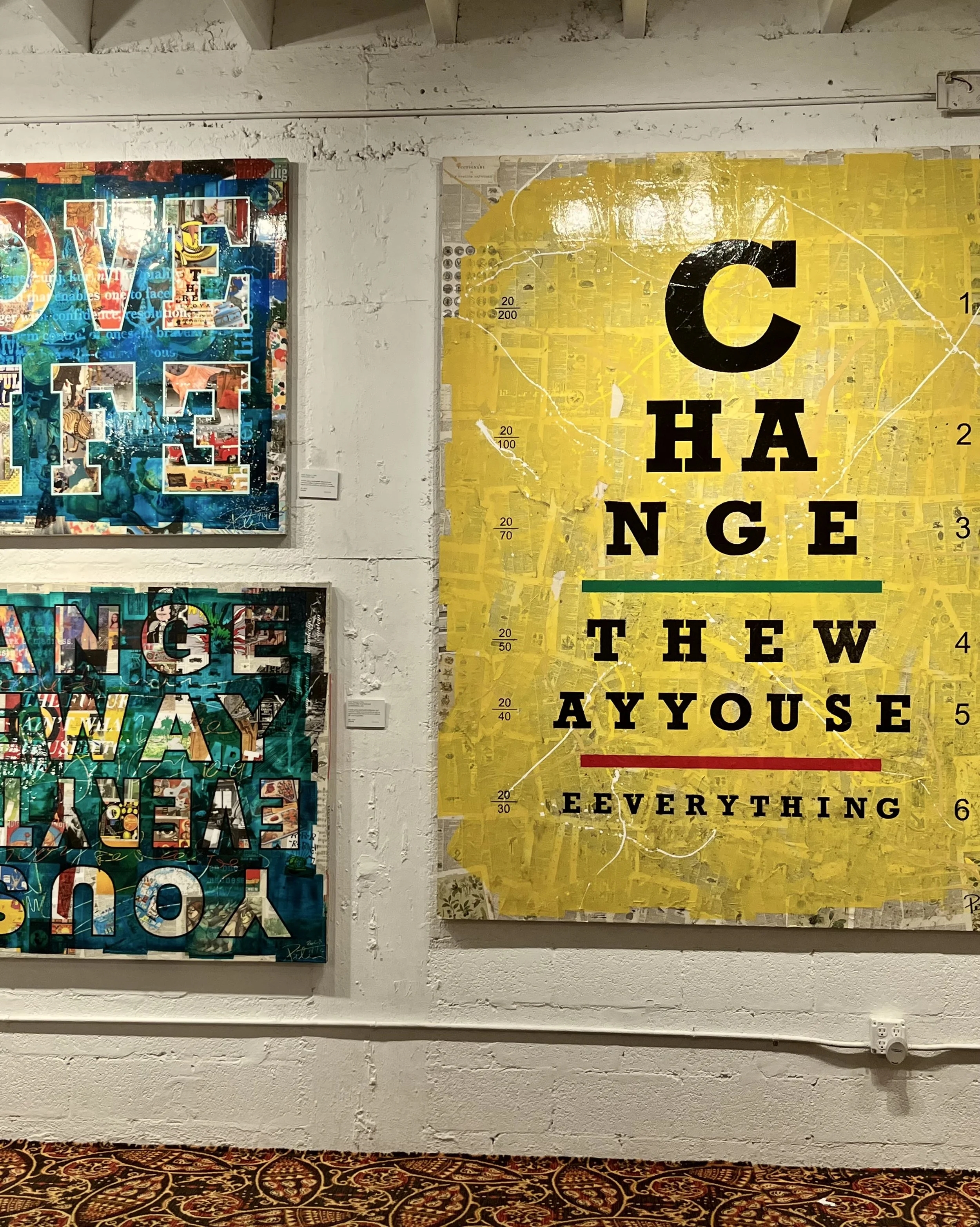 Wynwood Wall large yellow painting with the text change how you see everything