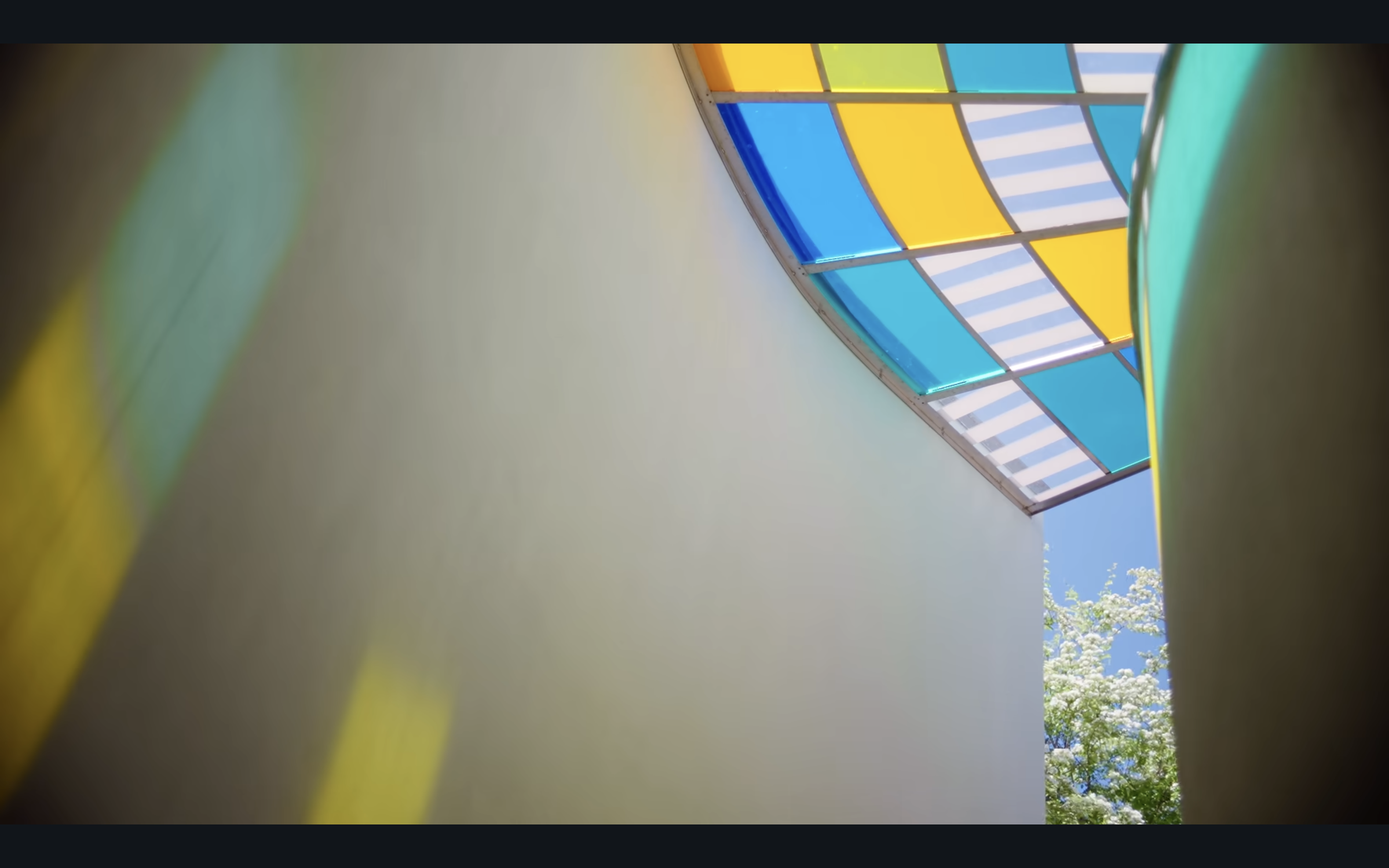 stairwell with colored glass roof