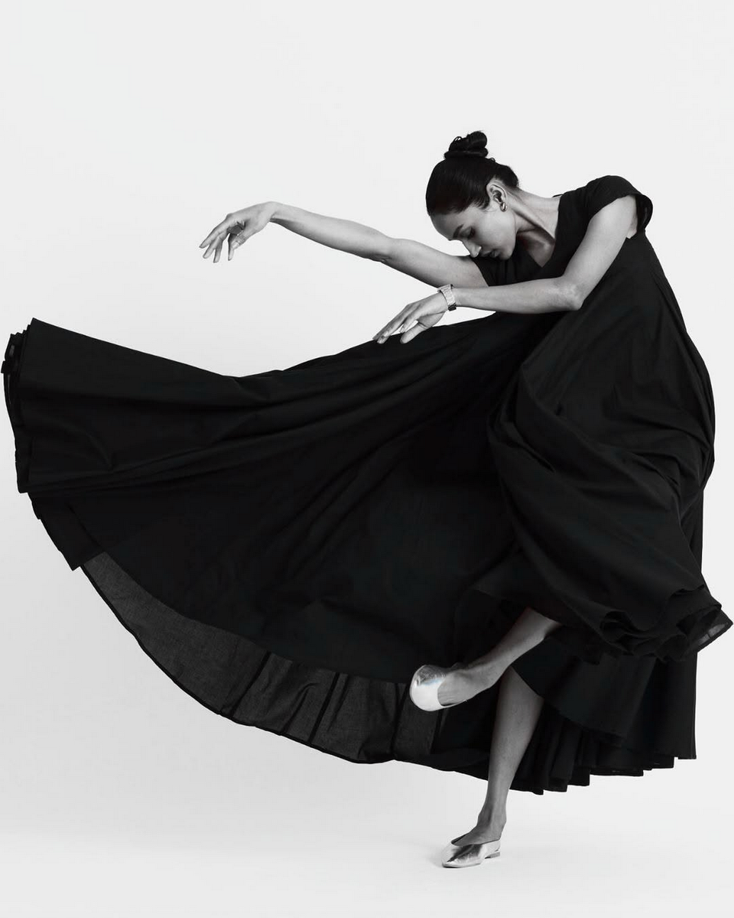 modern dancer in black full length dress