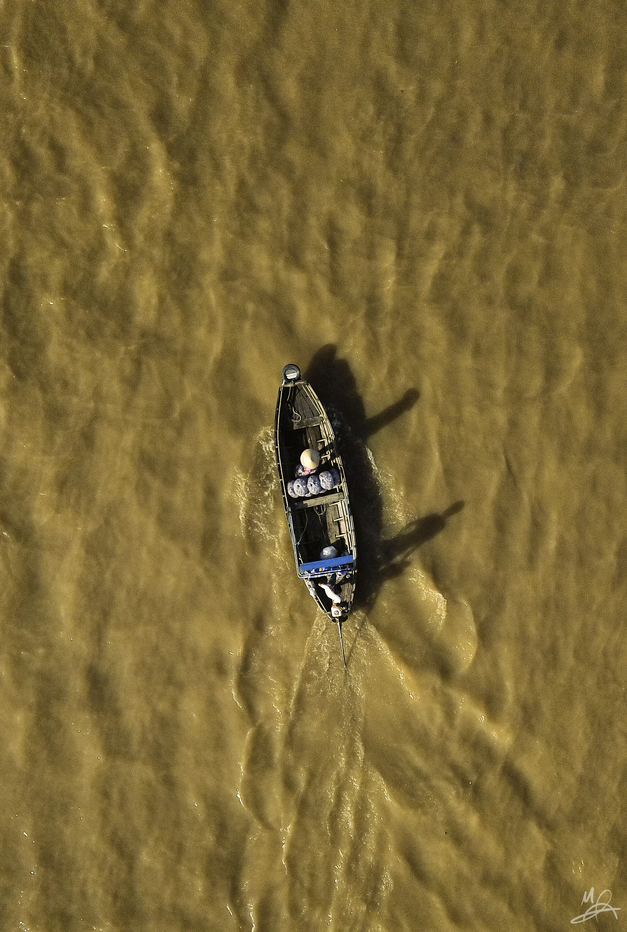 Tall shadows from a boat