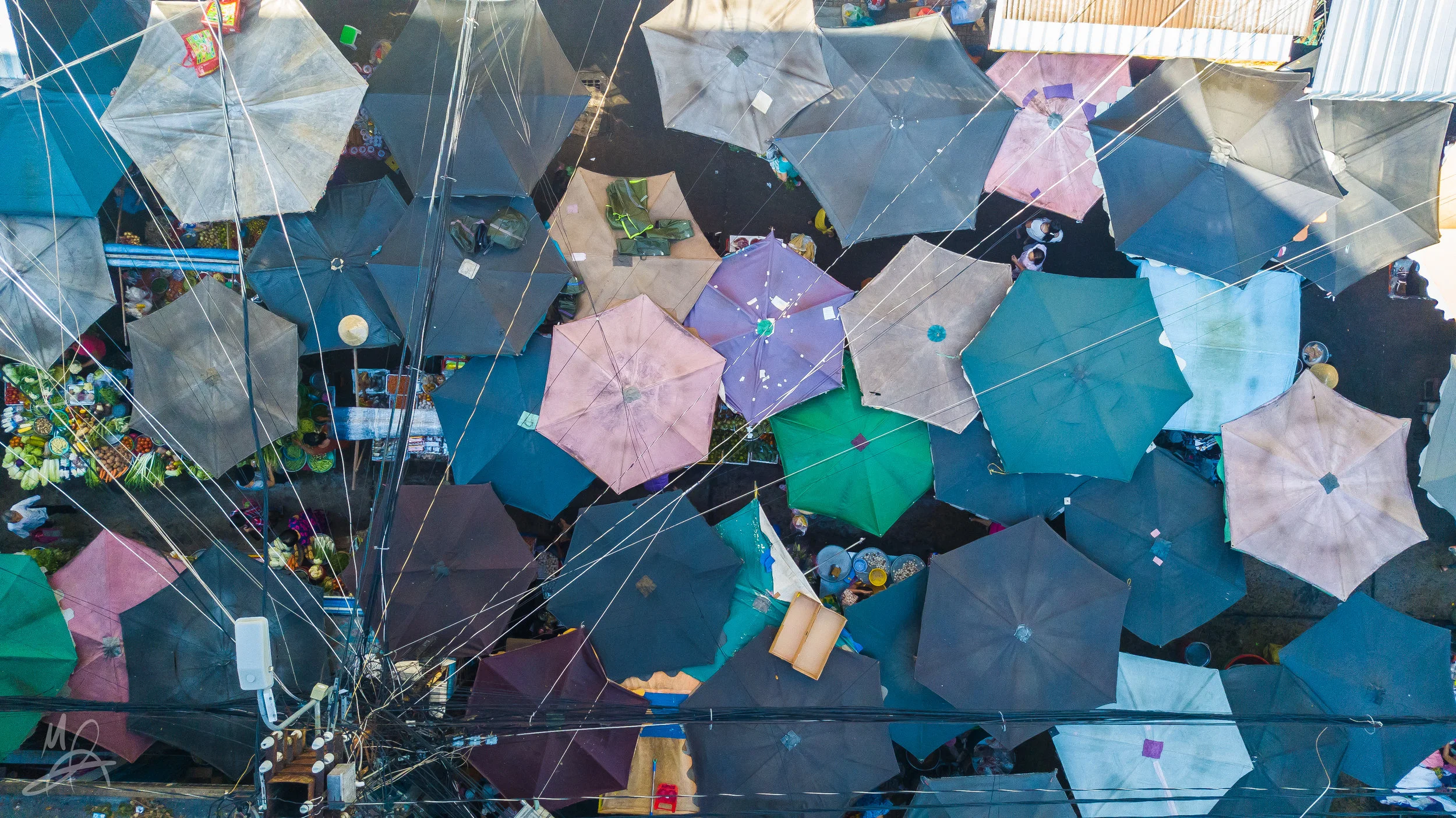 Umbrellas in a market 2/3