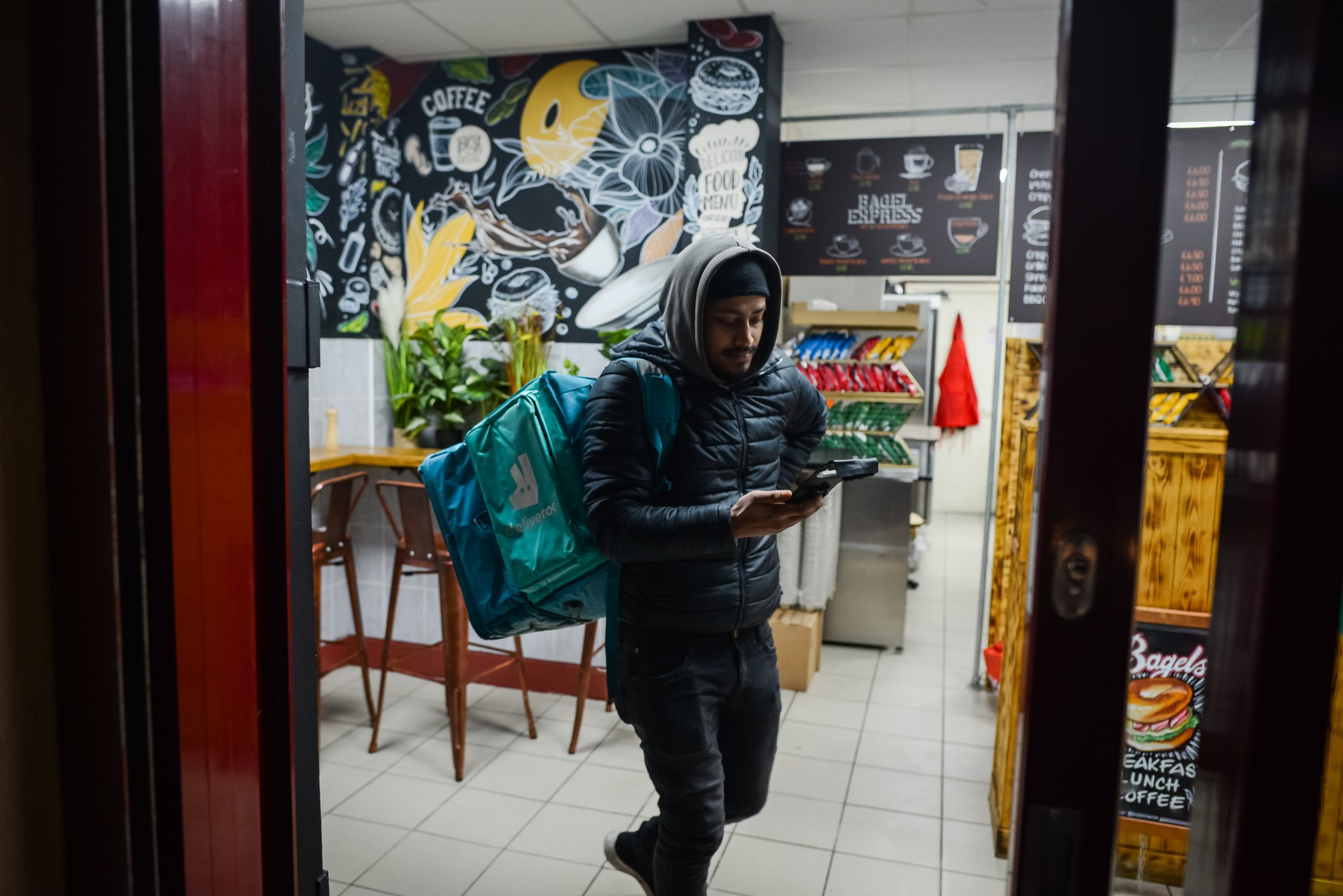  Nurul arrives at a restaurant near Liverpool Street to pick up a meal for his next delivery 