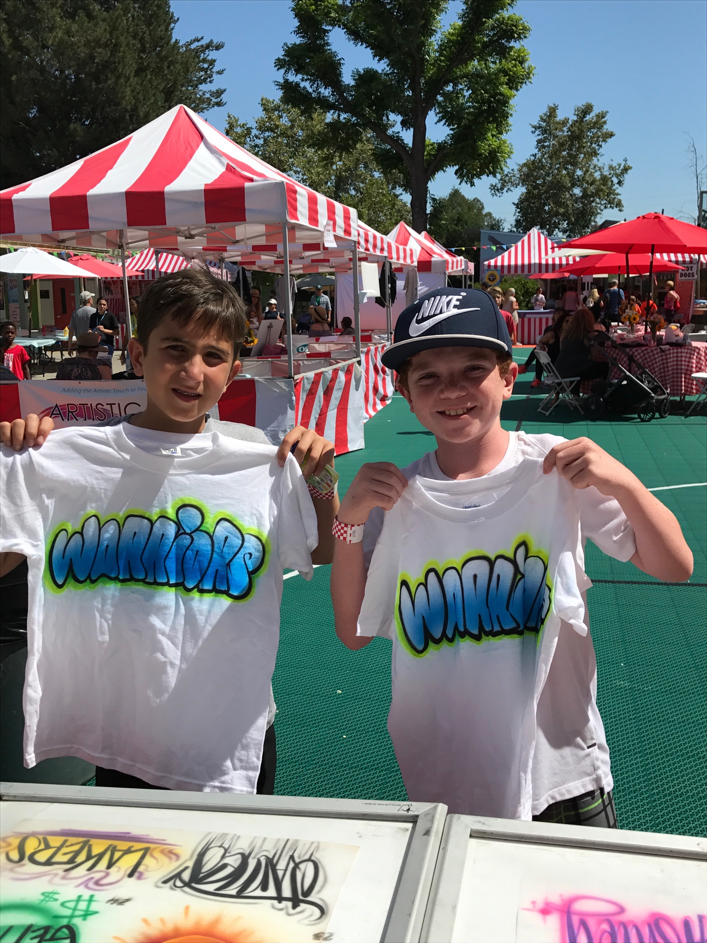 Airbrush t-shirts at a school carnival