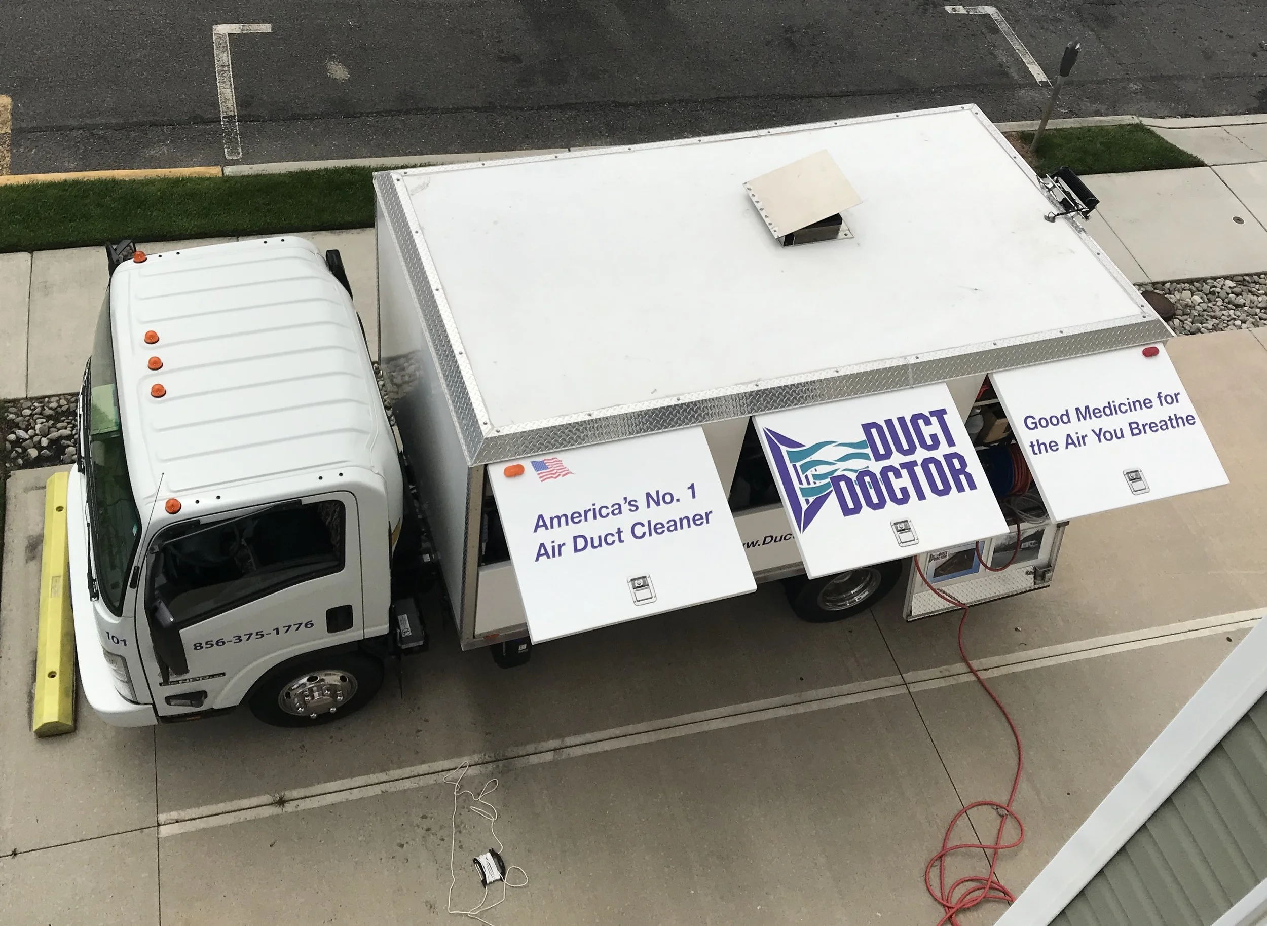 Duct Doctor air-duct-cleaning vacuum truck viewed from above.jpg