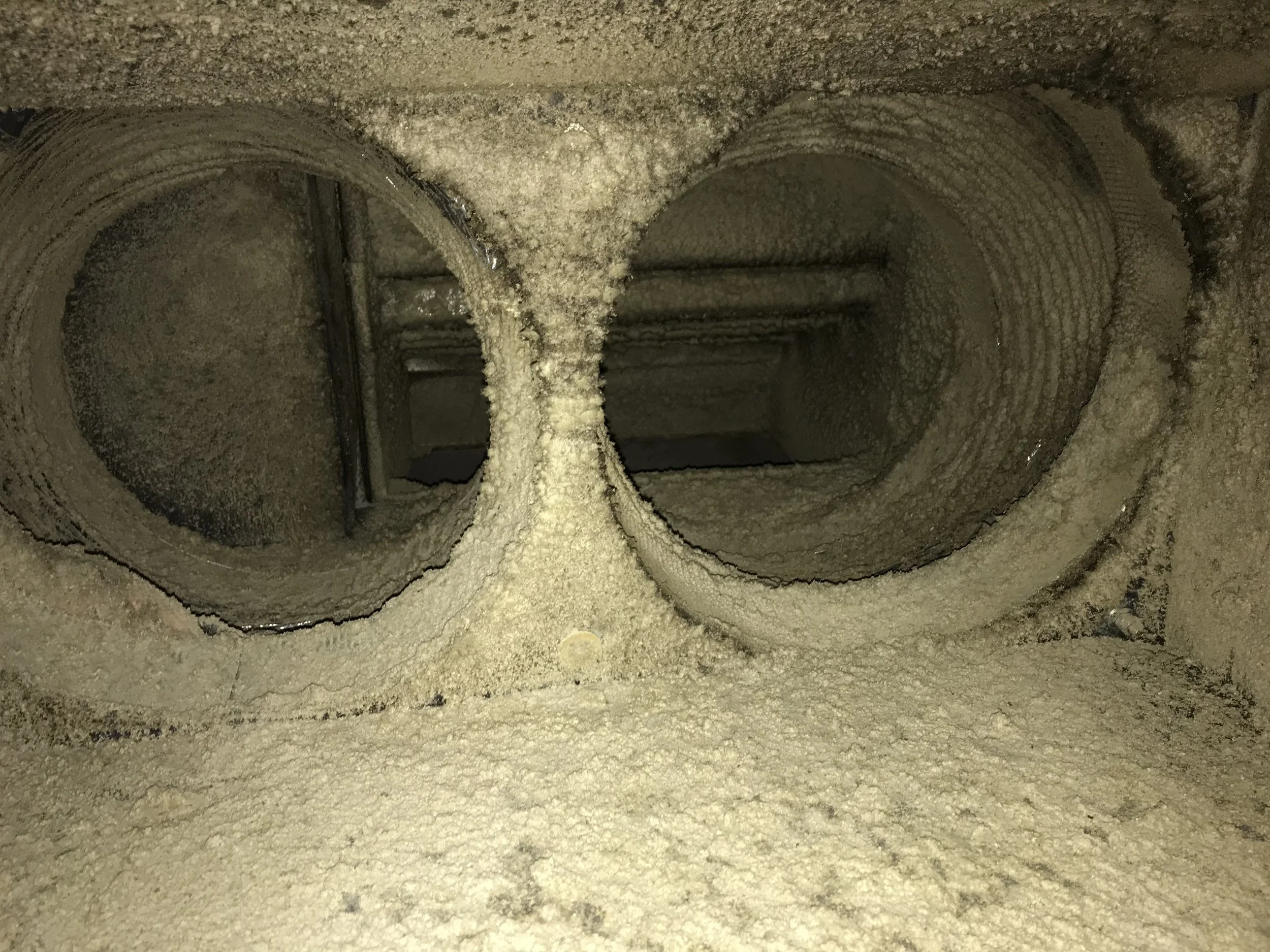Heavy deposits inside HVAC ductwork