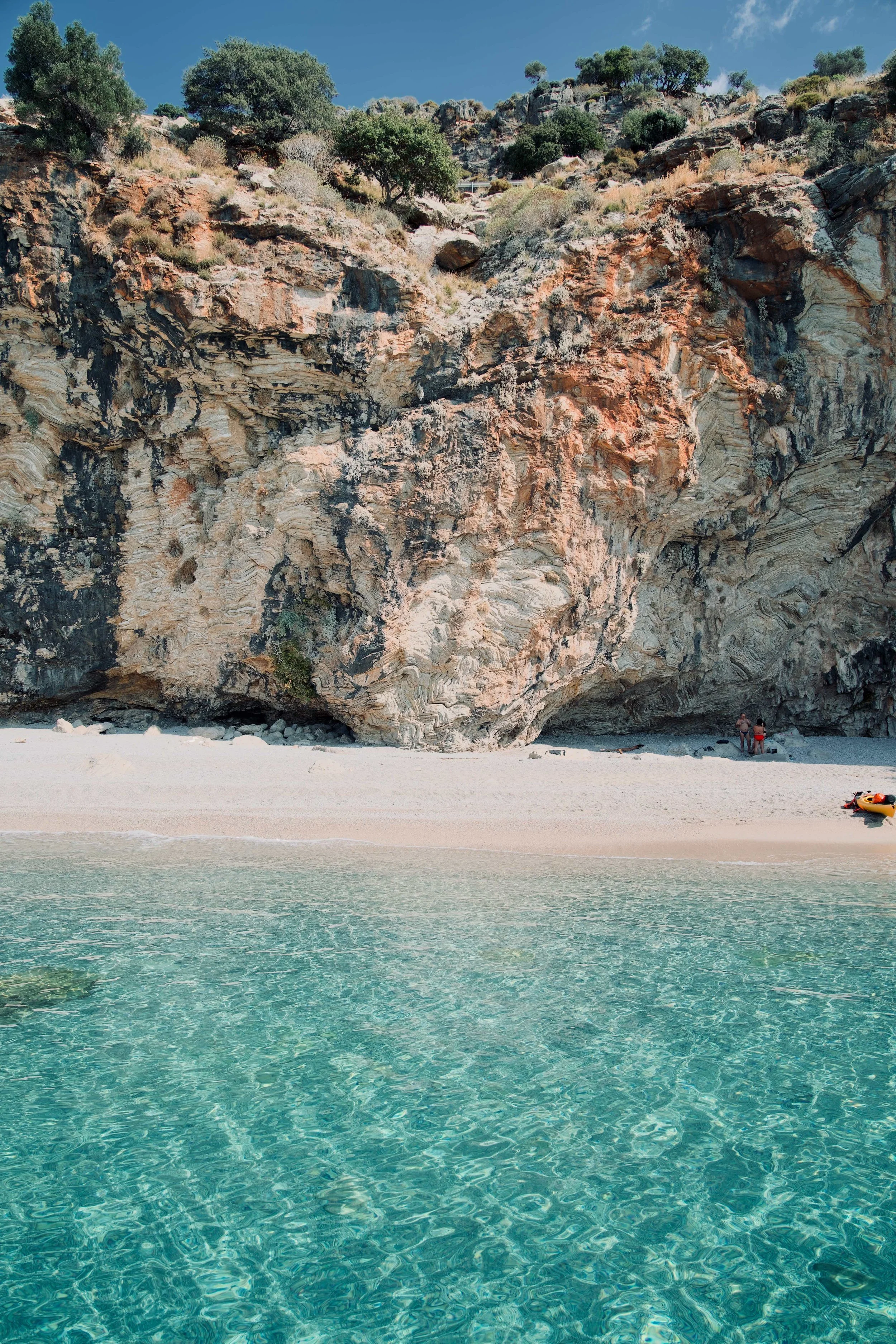 A view of a beach under the rock cliff faces near Fethiye, Türkiye (Turkey)