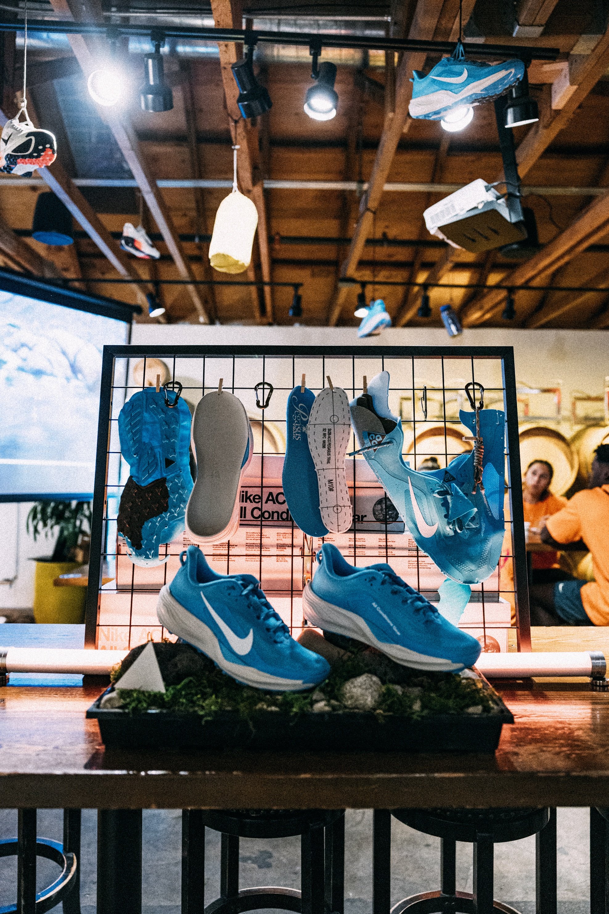 Custom Nike ACG product display and footwear trial zone inside Benny Boy Brewing experiential footprint