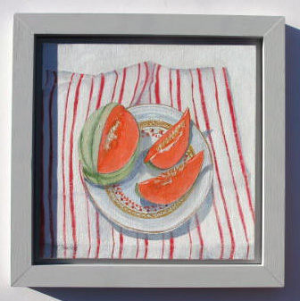 Framed oil painting of melon slices