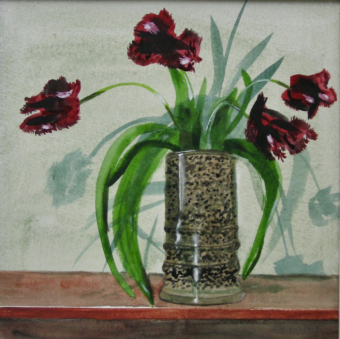 Black tulips in a studio pot by Cy Pawsey