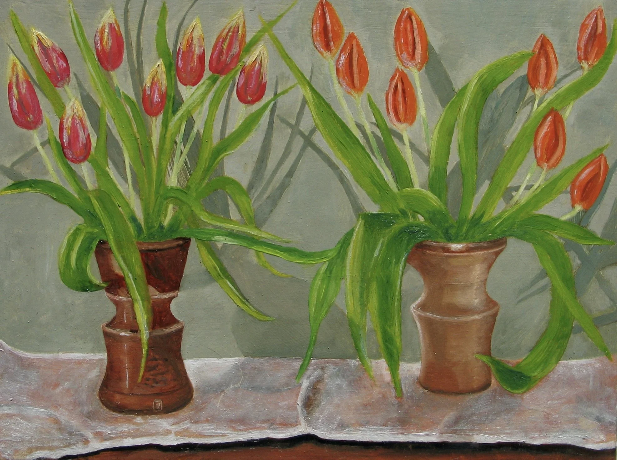 Tulips in studio pots, oil painting by Cy Pawsey