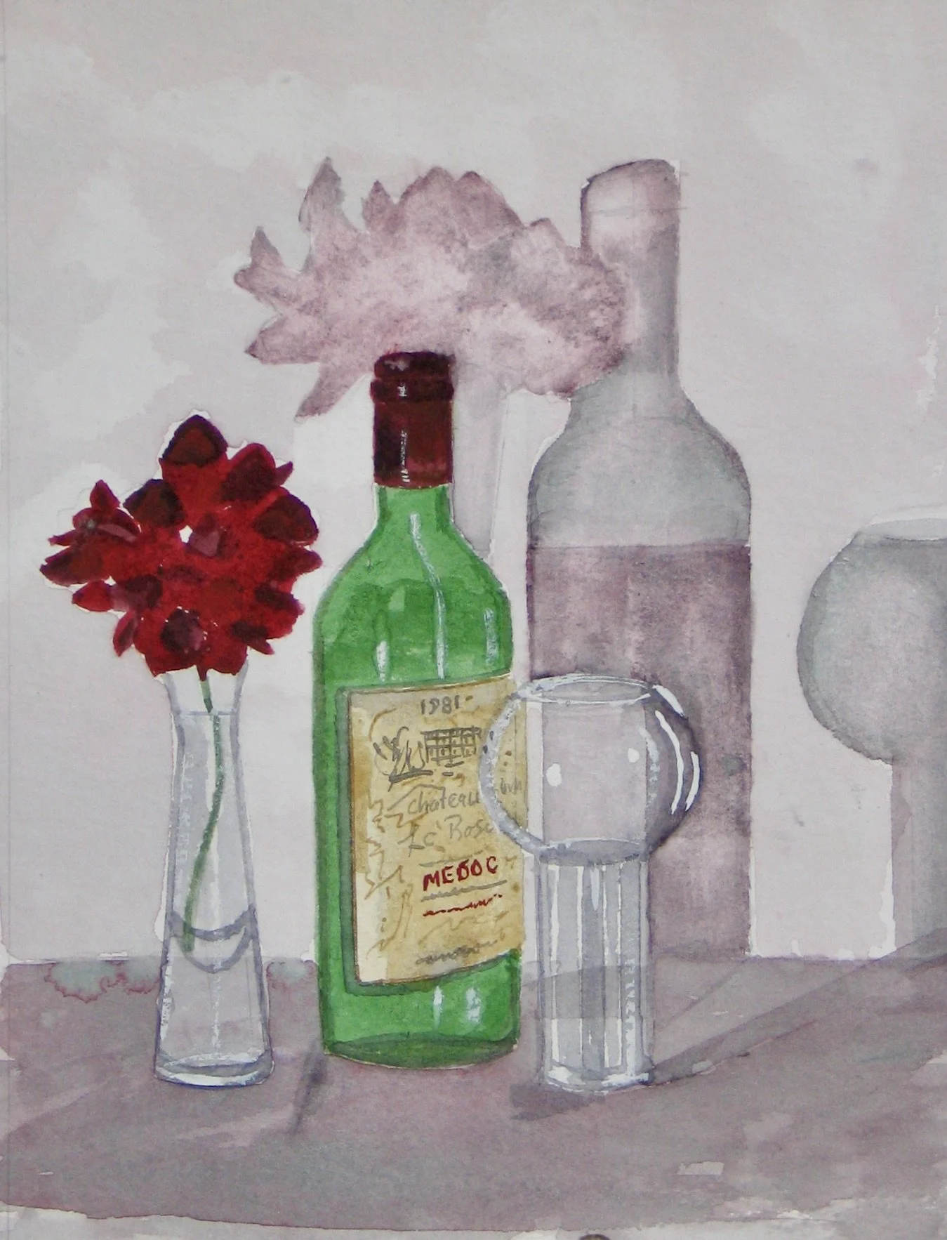 Geranium flower and vintage wine bottle