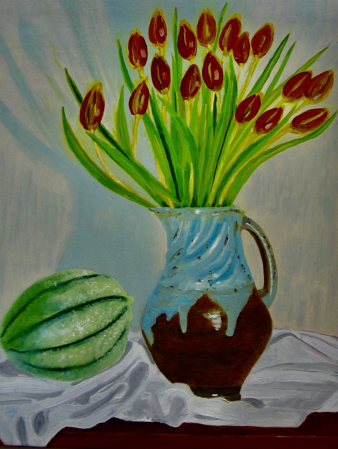 Tulips in a studio jug, oil painting by Cy Pawsey