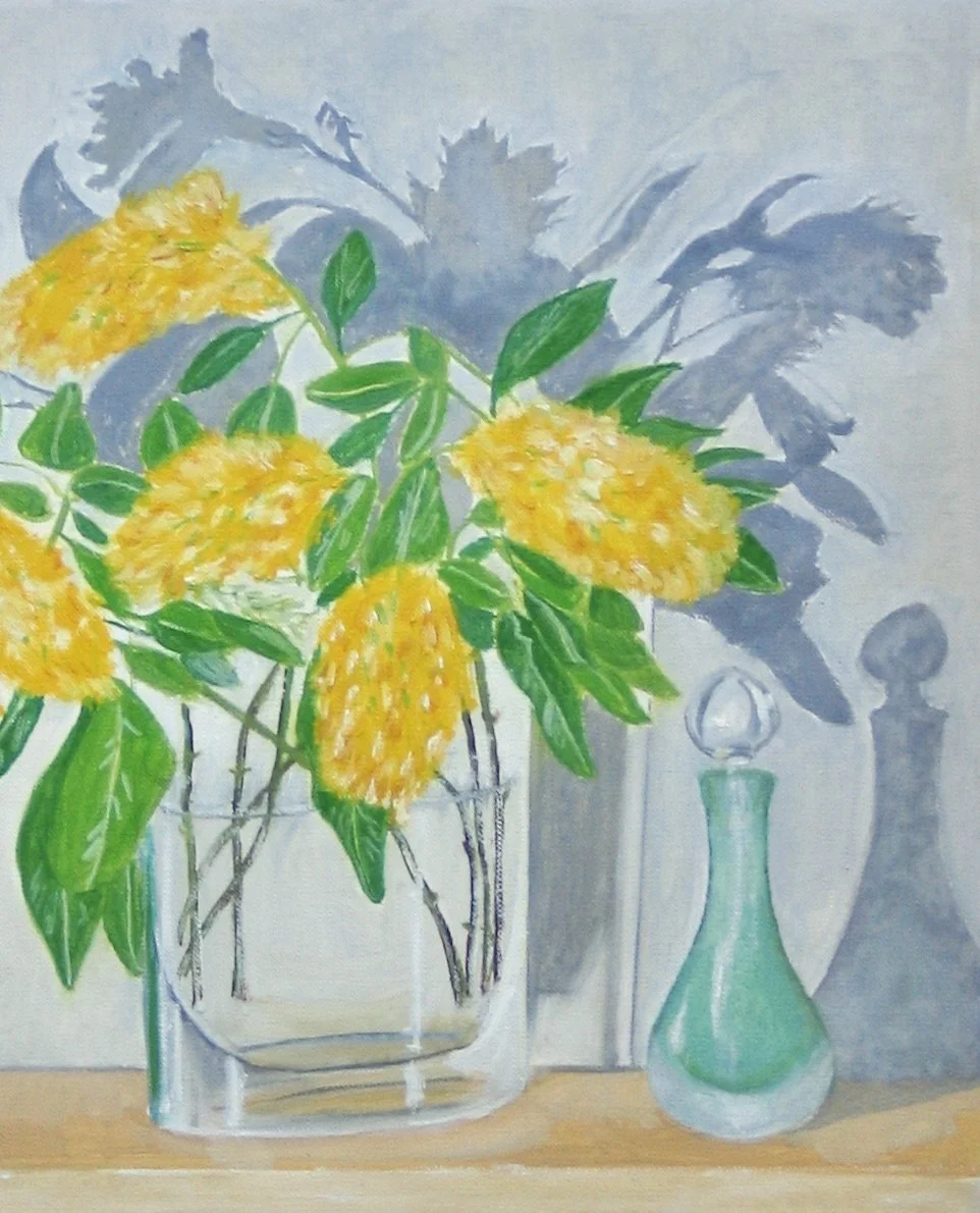 Pineapple broom flowers in a glass vase at galeriecy.com