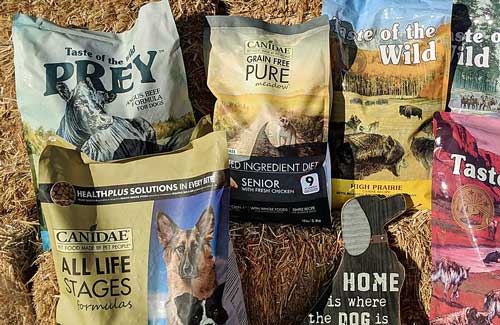 display featuring various brands of bagged dog food