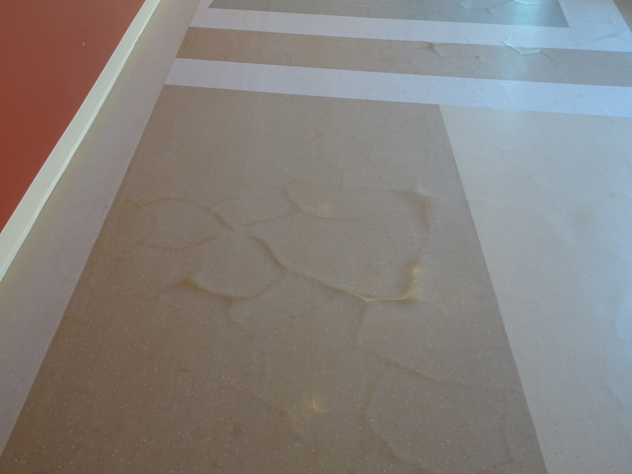 Debonding of resilient sheet vinyl flooring