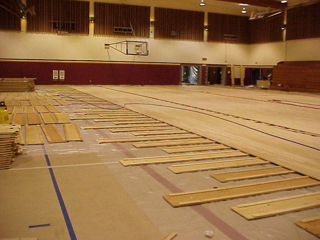 New hardwoos system being installed in a gymnasium