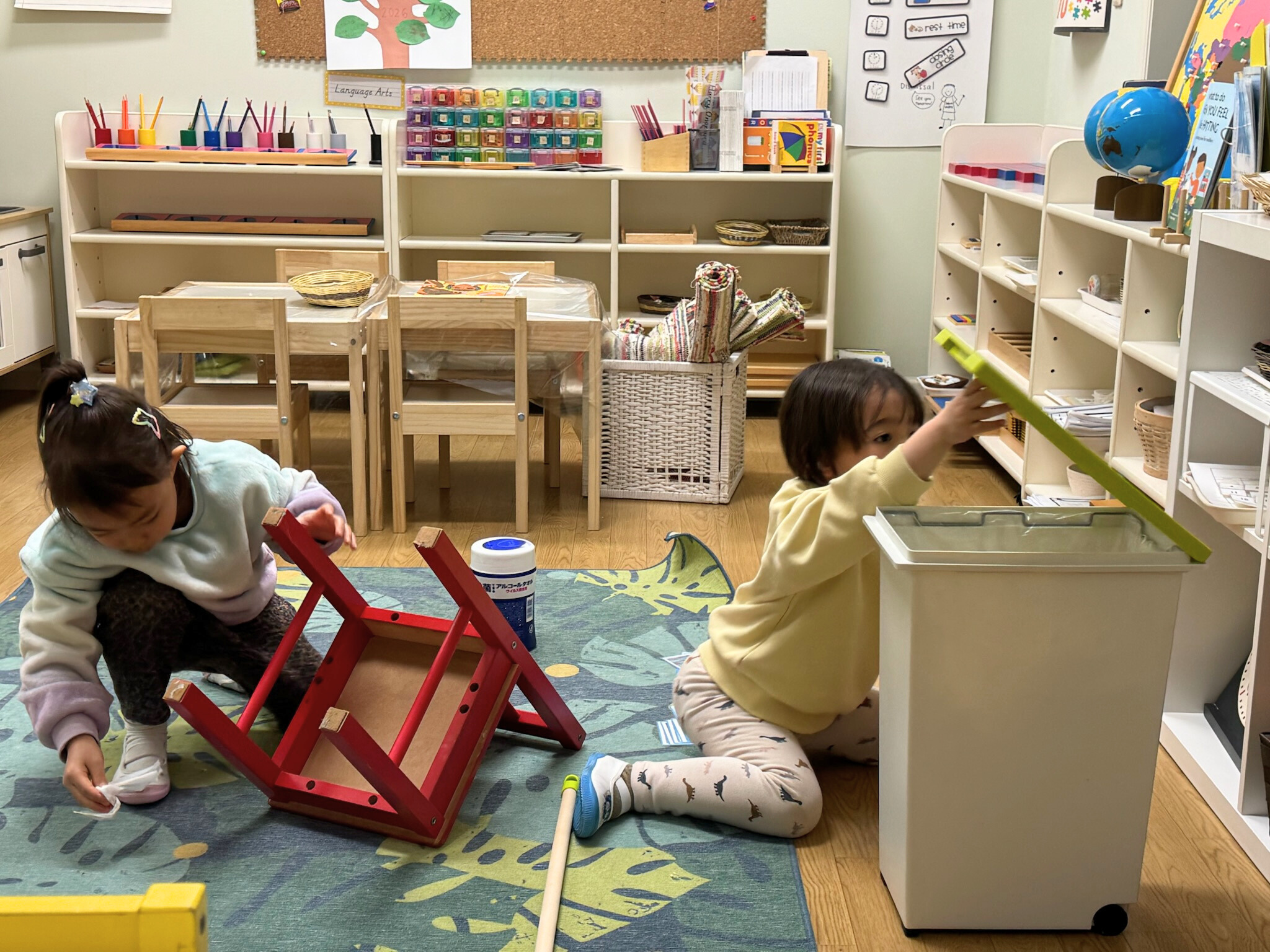 Children engaged in independent Montessori work at a preschool in Setagaya, Tokyo