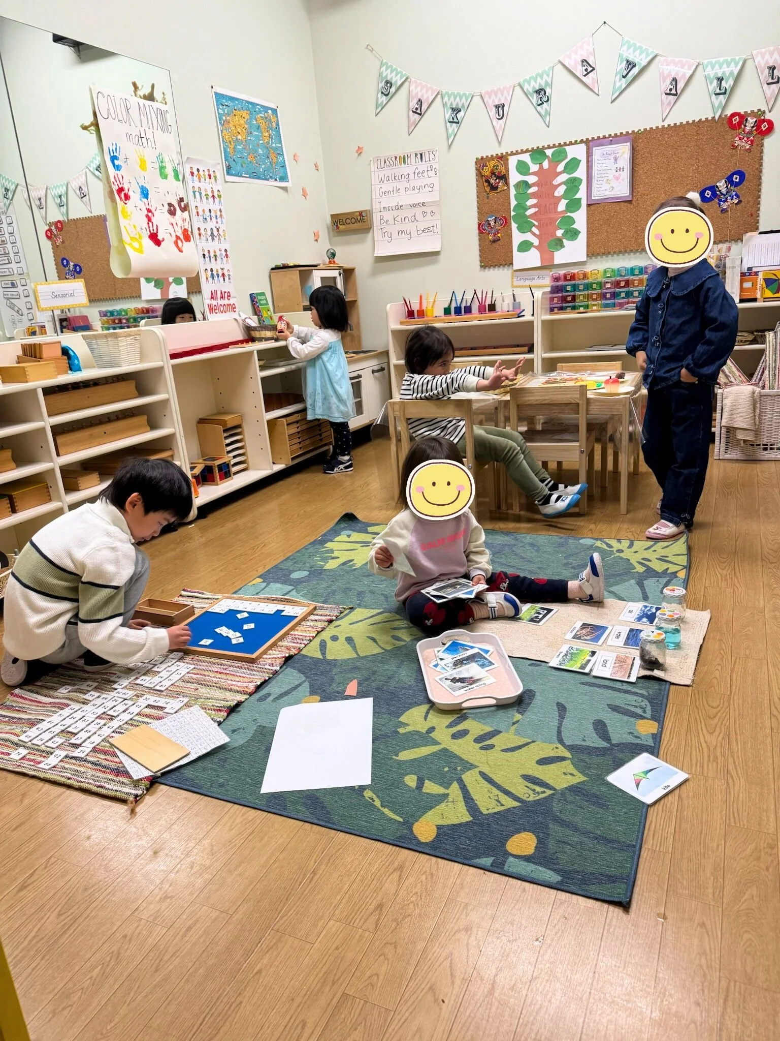 Children engaged in independent Montessori work at a preschool in Setagaya, Tokyo