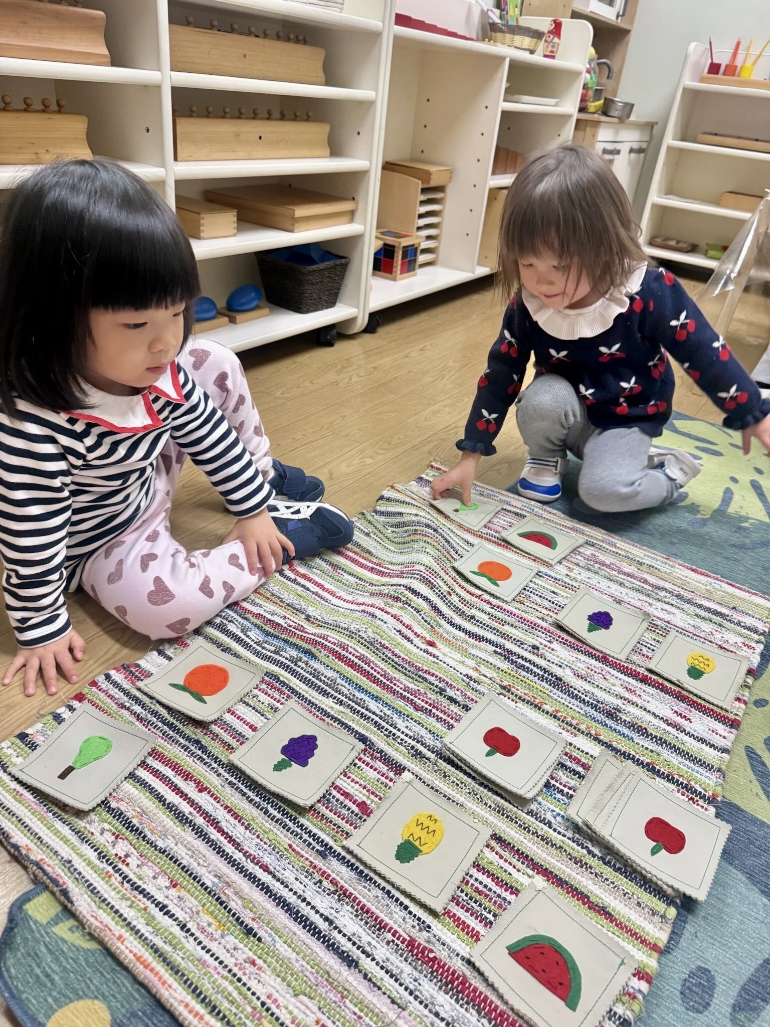 Children engaging in Montessori Matching work