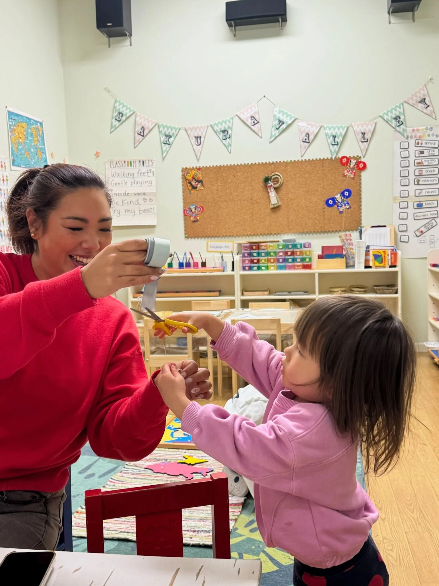Children engaged in independent Montessori work at a preschool in Setagaya, Tokyo