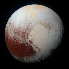 Landing on Pluto: the demi-planet with heart