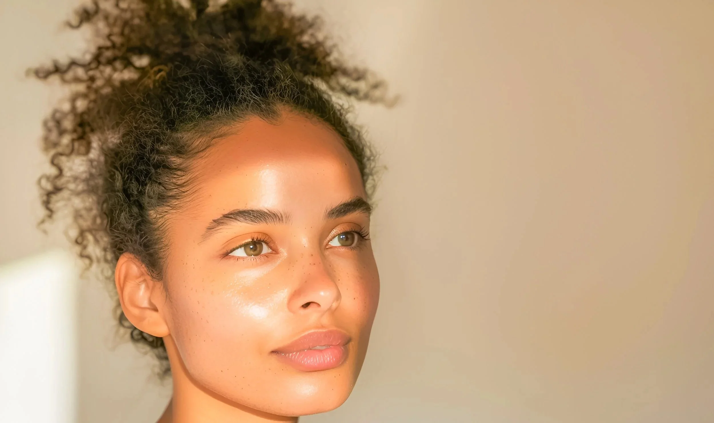 Person with calm expression and settled skin representing reduced inflammation and improved skin balance