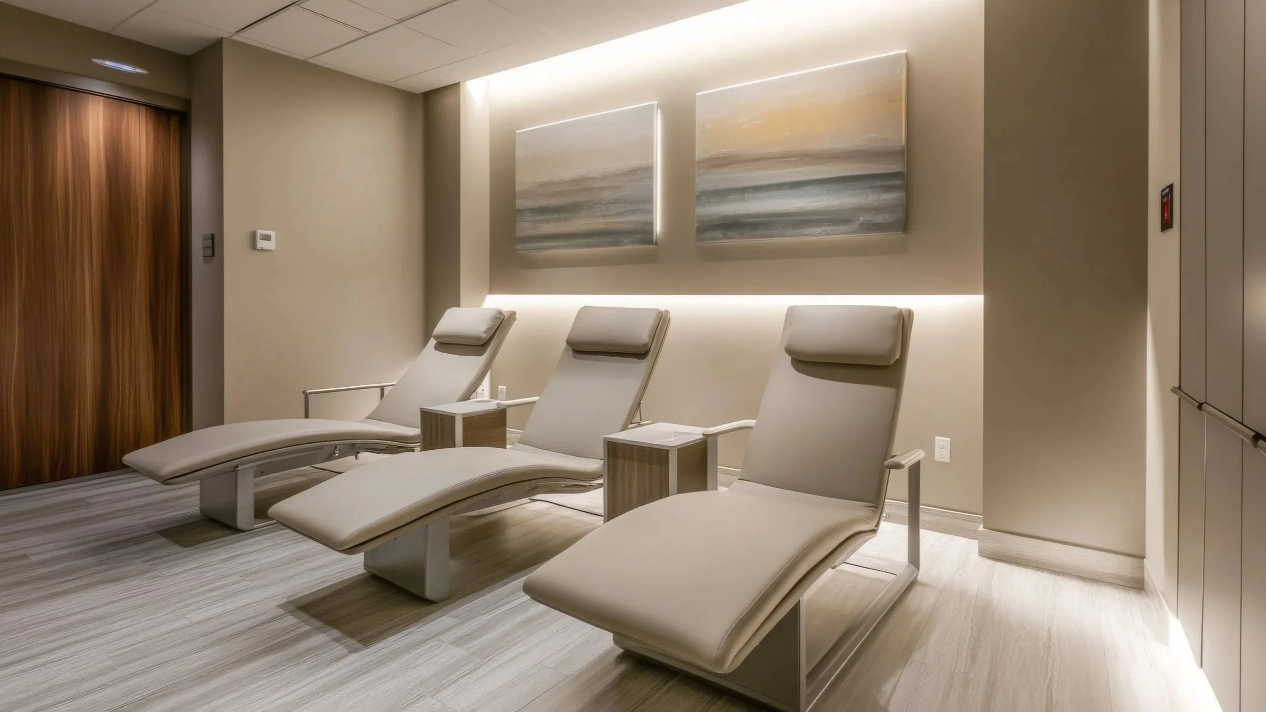 Modern recovery room with neutral lighting and minimal design elements