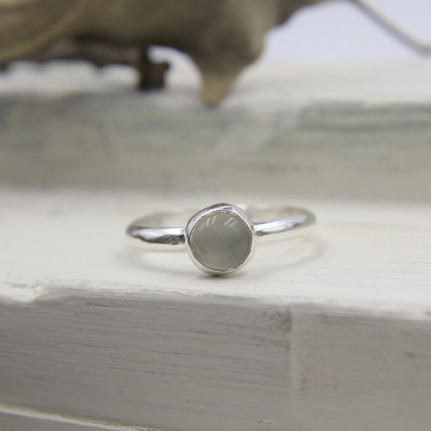 White moonstone sterling silver ring on display