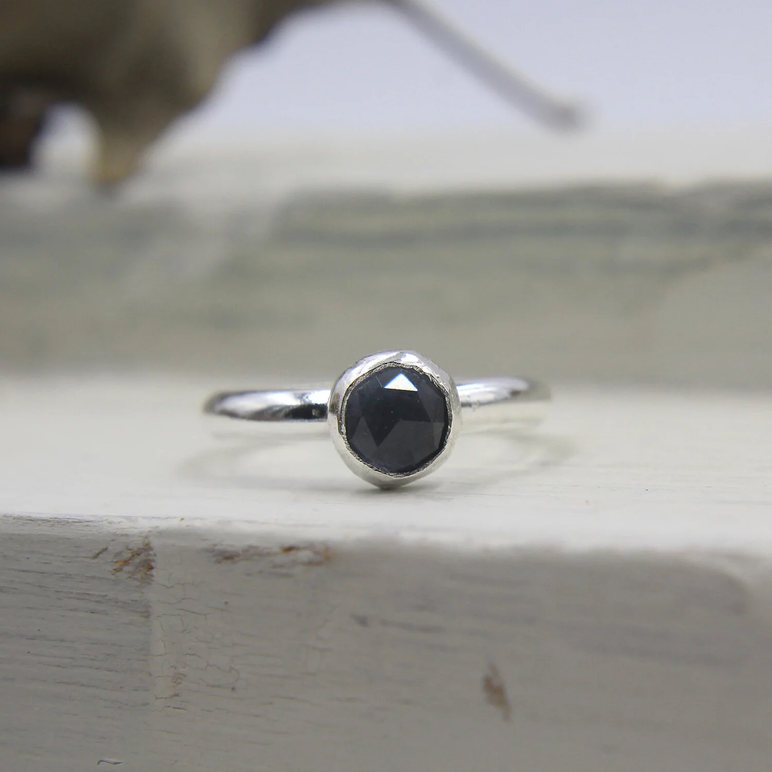 Ocean gray quartz sterling silver ring on display