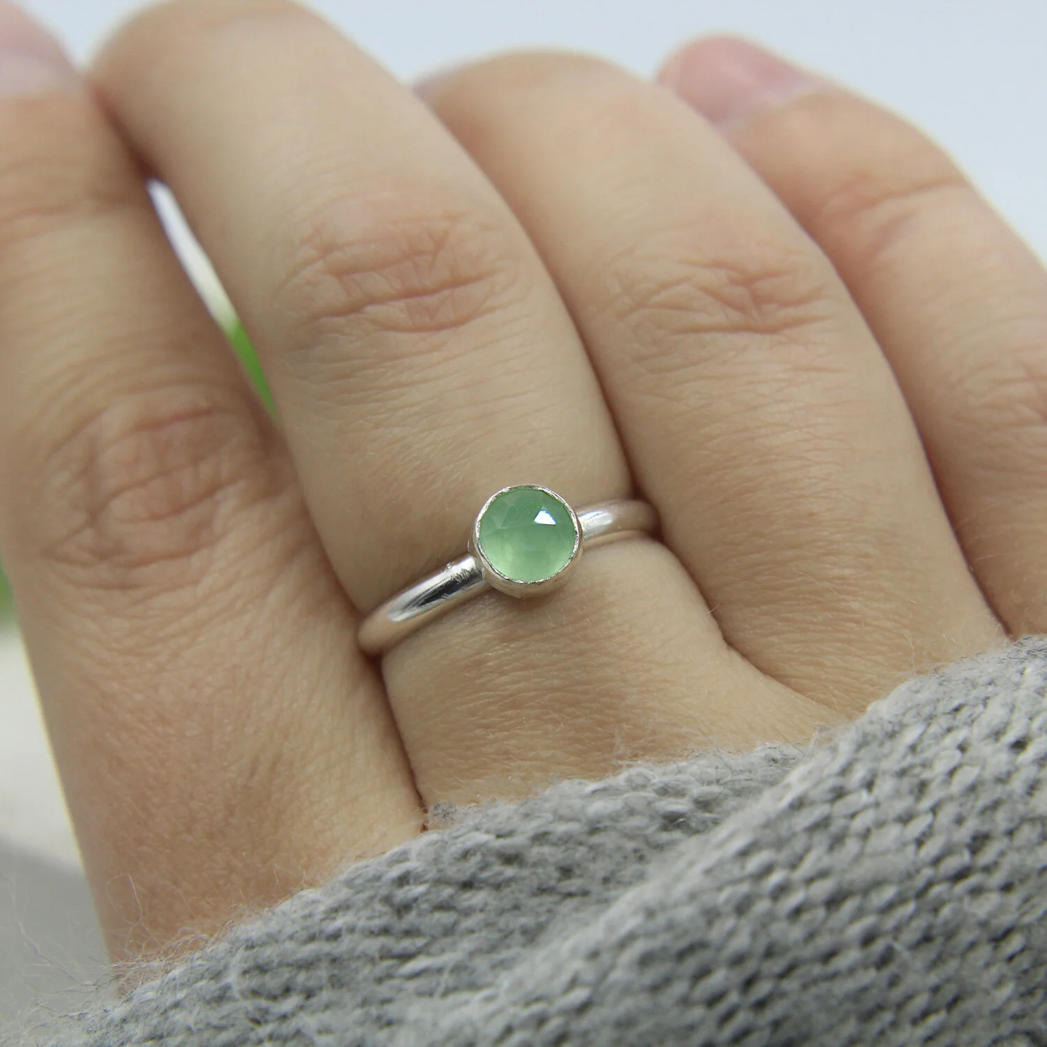 Lime chalcedony sterling silver ring on hand