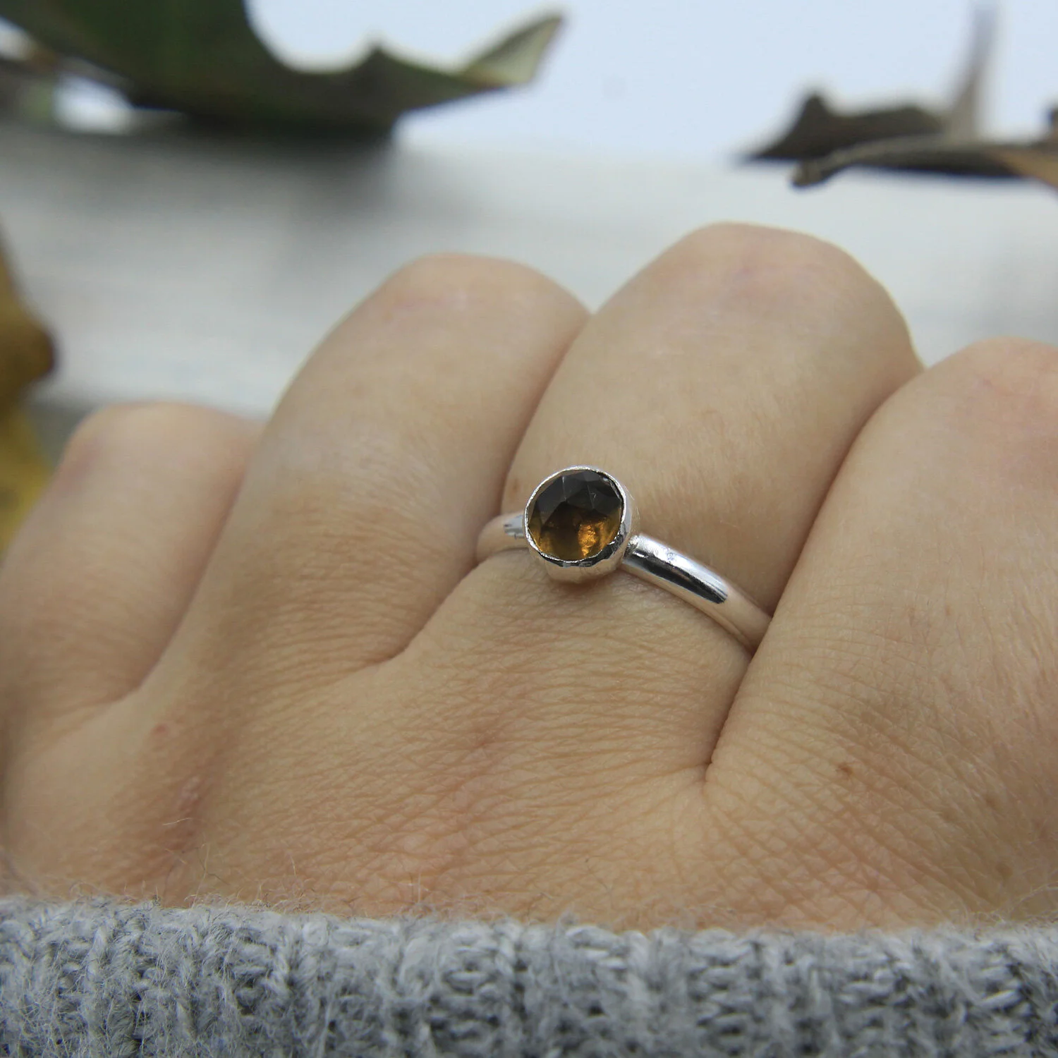 Smoky quartz sterling silver ring on hand