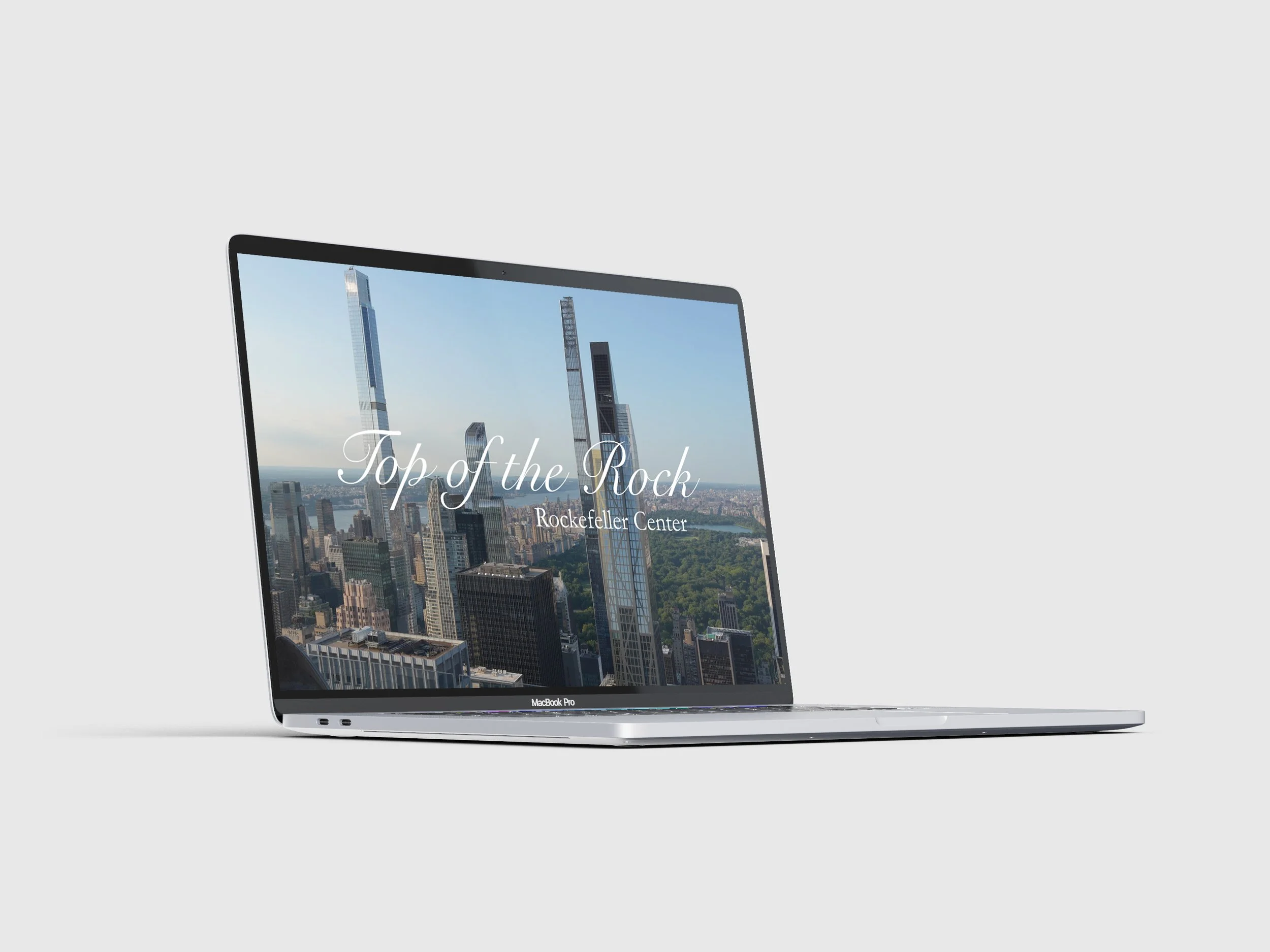nycsunsettopofrockmacbook.jpg