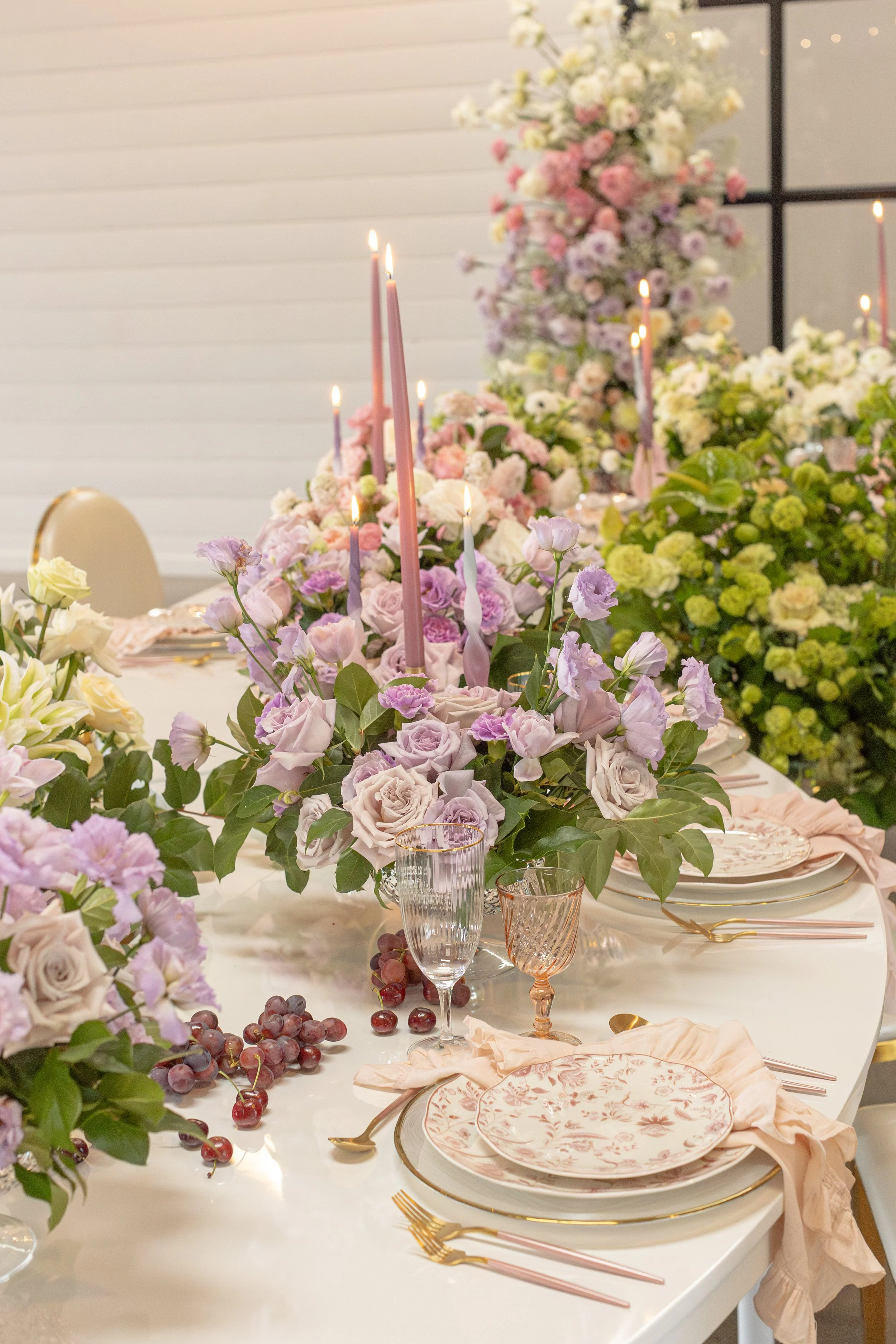 lush-elegant-full-color-colorful-long-table-candles-luxury-floral-design-flower-centerpieces-purple-pink-green-orange-long-table-centerpiece-wedding-event-design-florist.jpg
