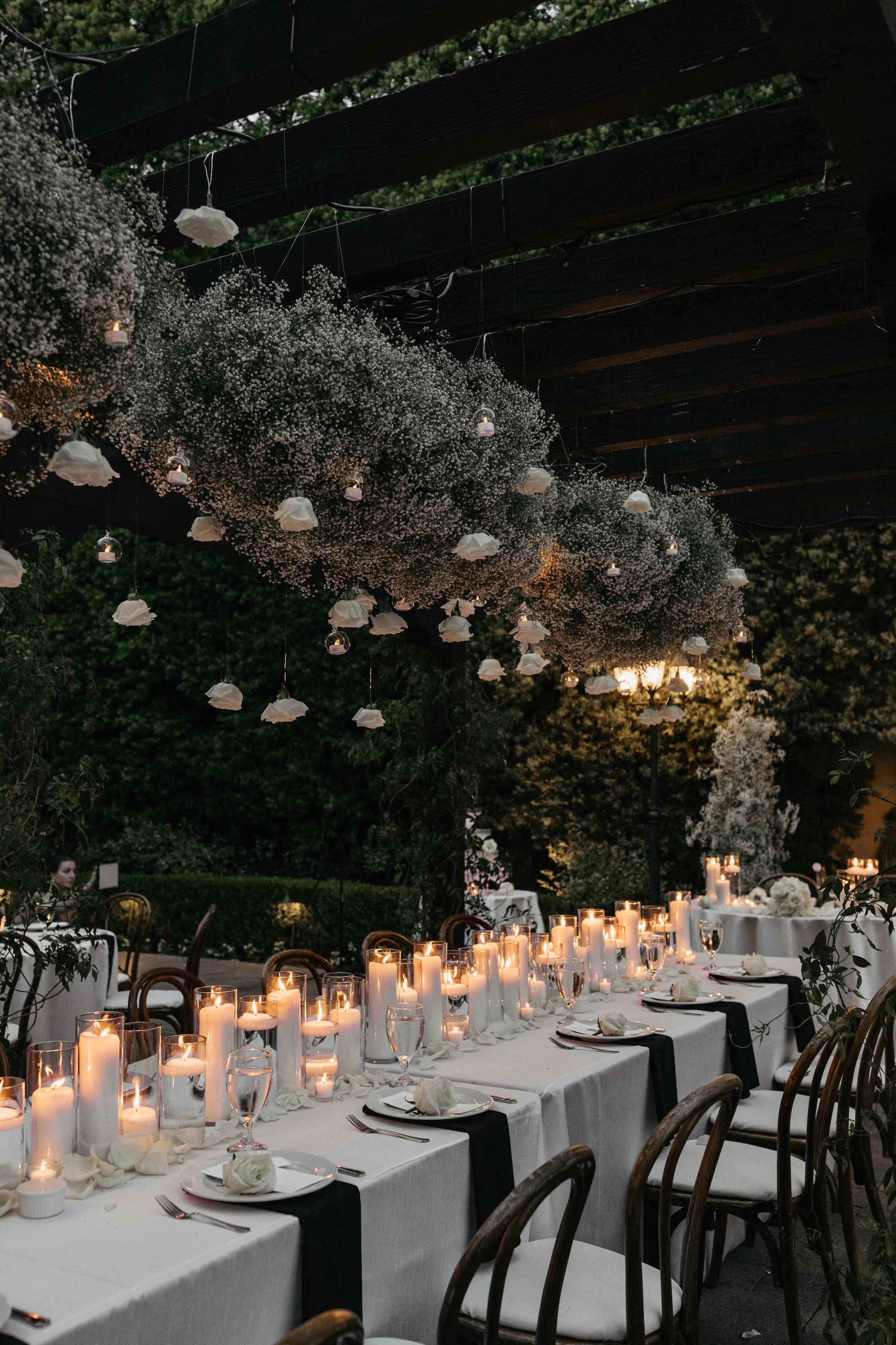 wedding-flowers-custom-design-white-roses-babysbreath-columns-ceremony-altar-arch-decor-hanging-floral-cloud-installation-long-table-centerpiece-candles-lovelia.jpg