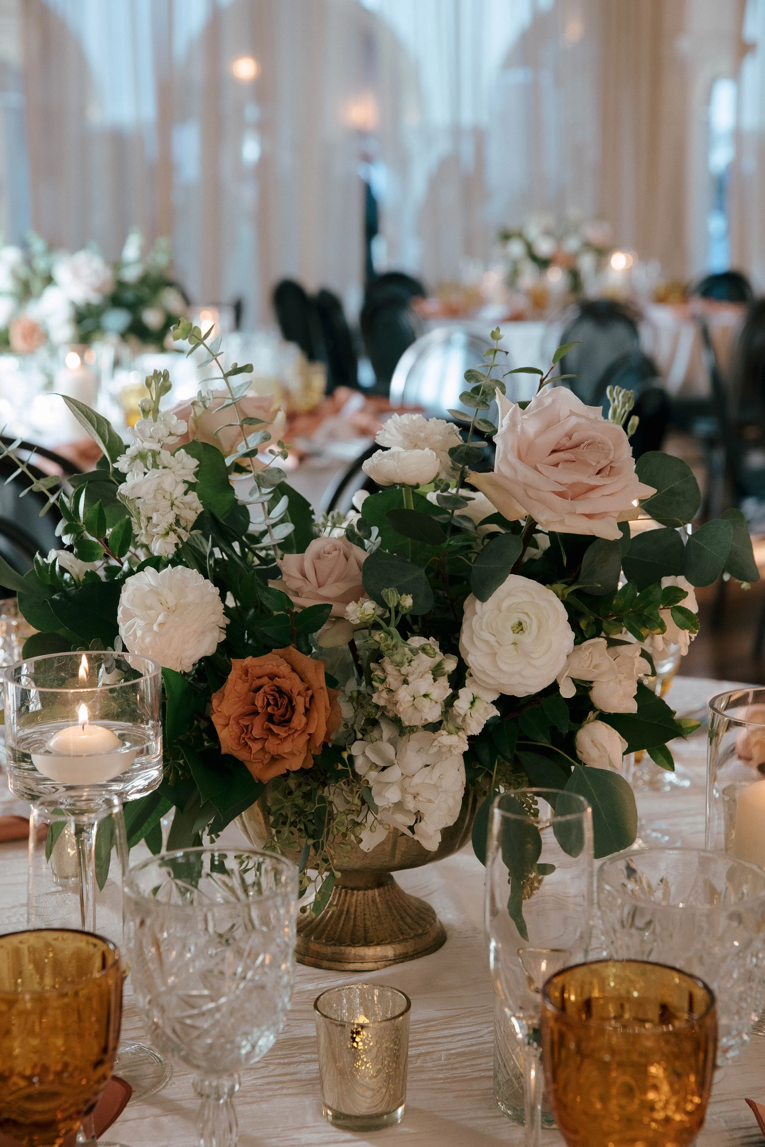 Low wedding centerpiece with toffee roses at The Ebell Long Beach