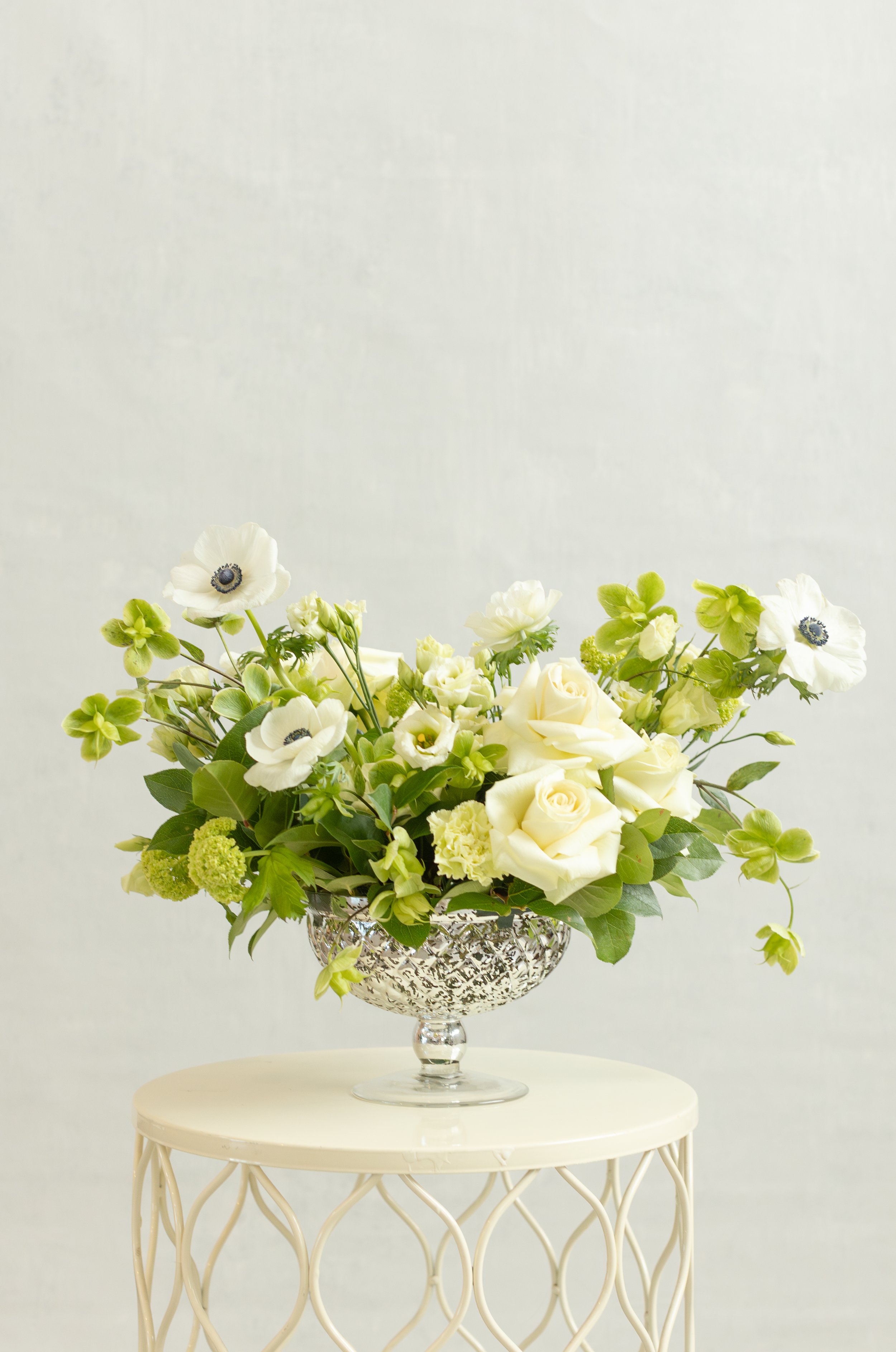 luxury-floral-design-flower-centerpieces-white-green-orange-round-table-centerpiece-wedding-event-design-florist.jpg