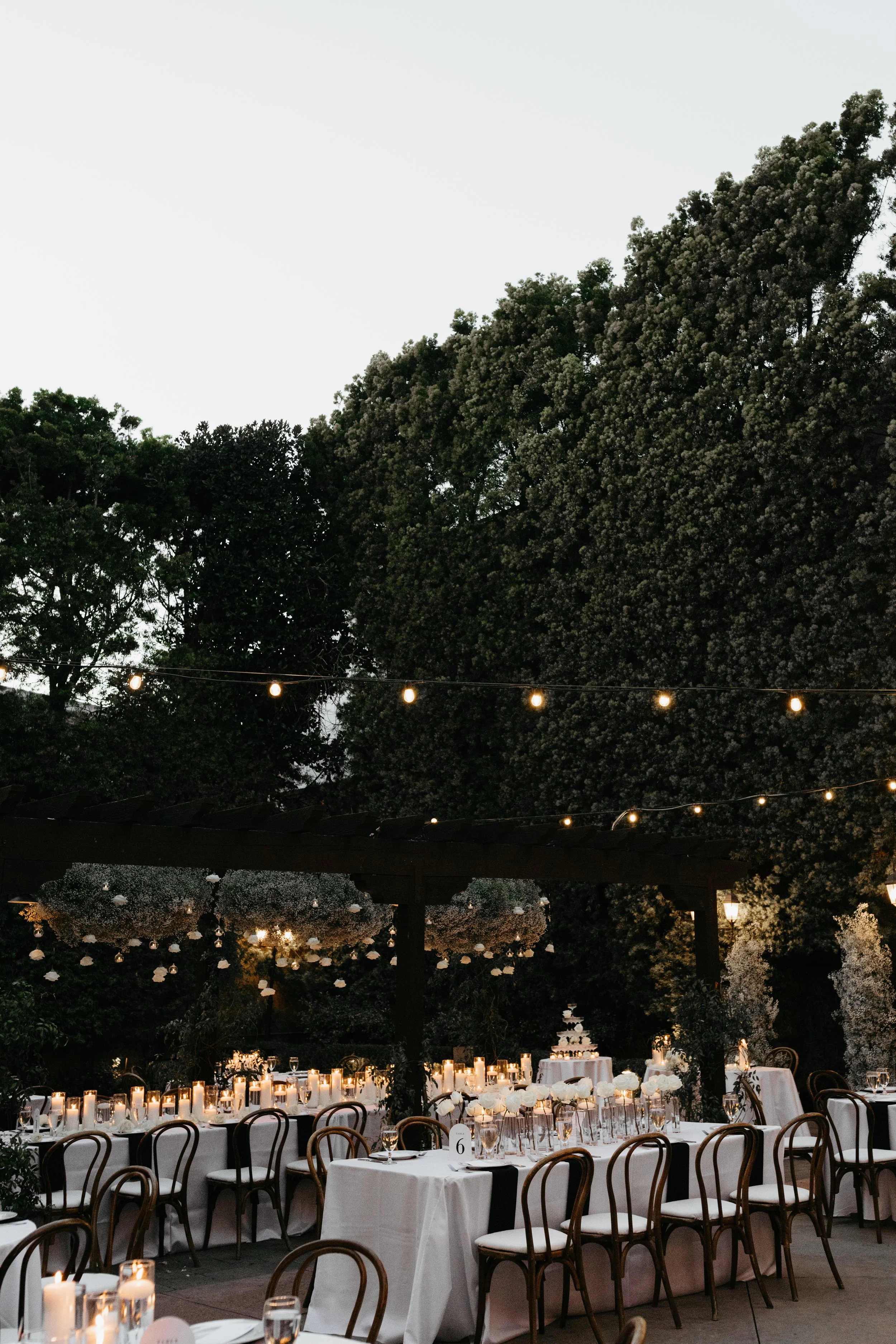 wedding-flowers-custom-design-white-roses-decor-hanging-floral-cloud-installation-long-table-centerpiece-candles-outdoors-patio-garden-celebration-franciscan- gardens-eco-friendly-lovelia.jpg