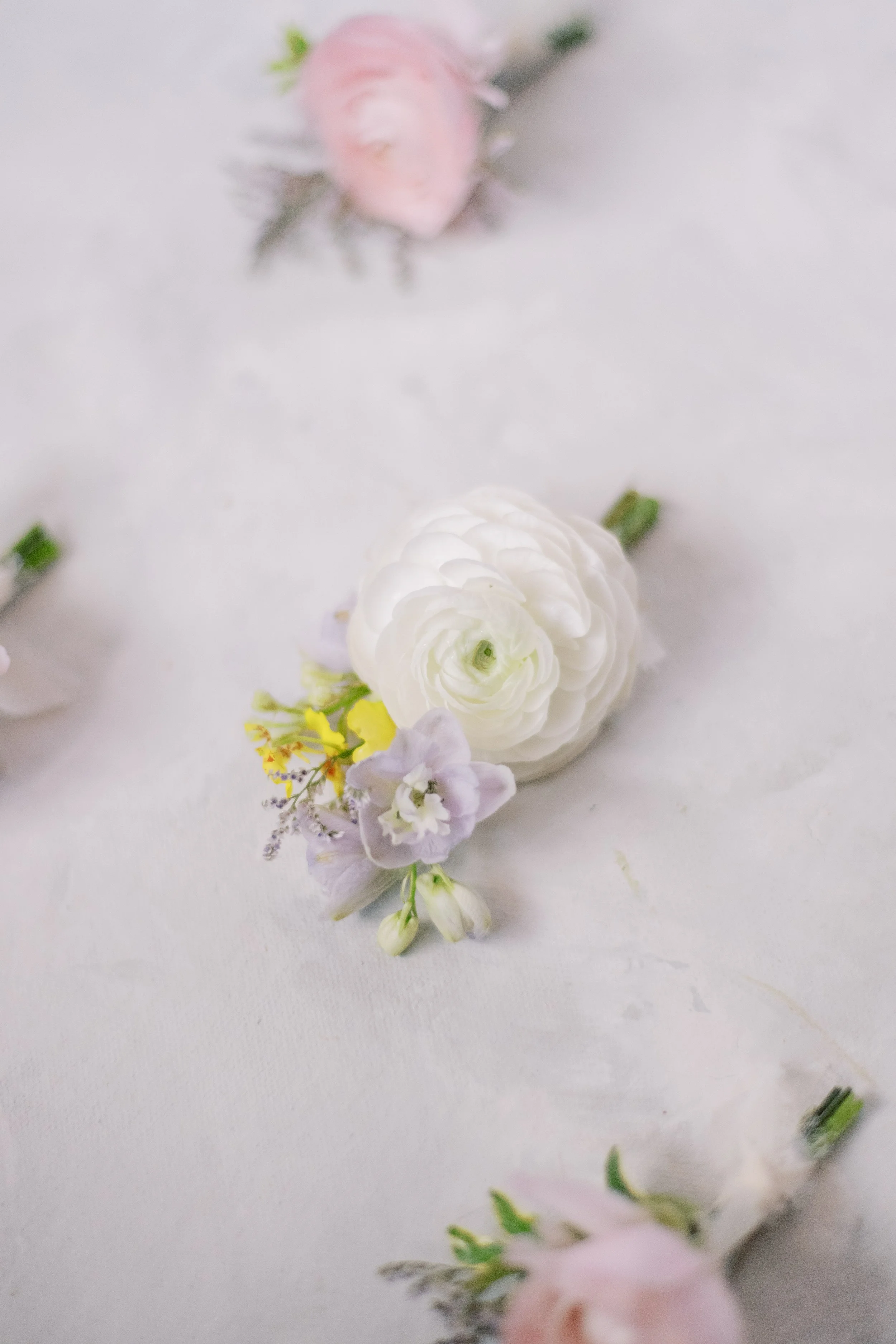 whimsical-garden-pastel-colors-sweet-romantic-soft-flowers-wedding-floral-design-florist-outdoor-spring-boutonnieres-lovelia.jpg