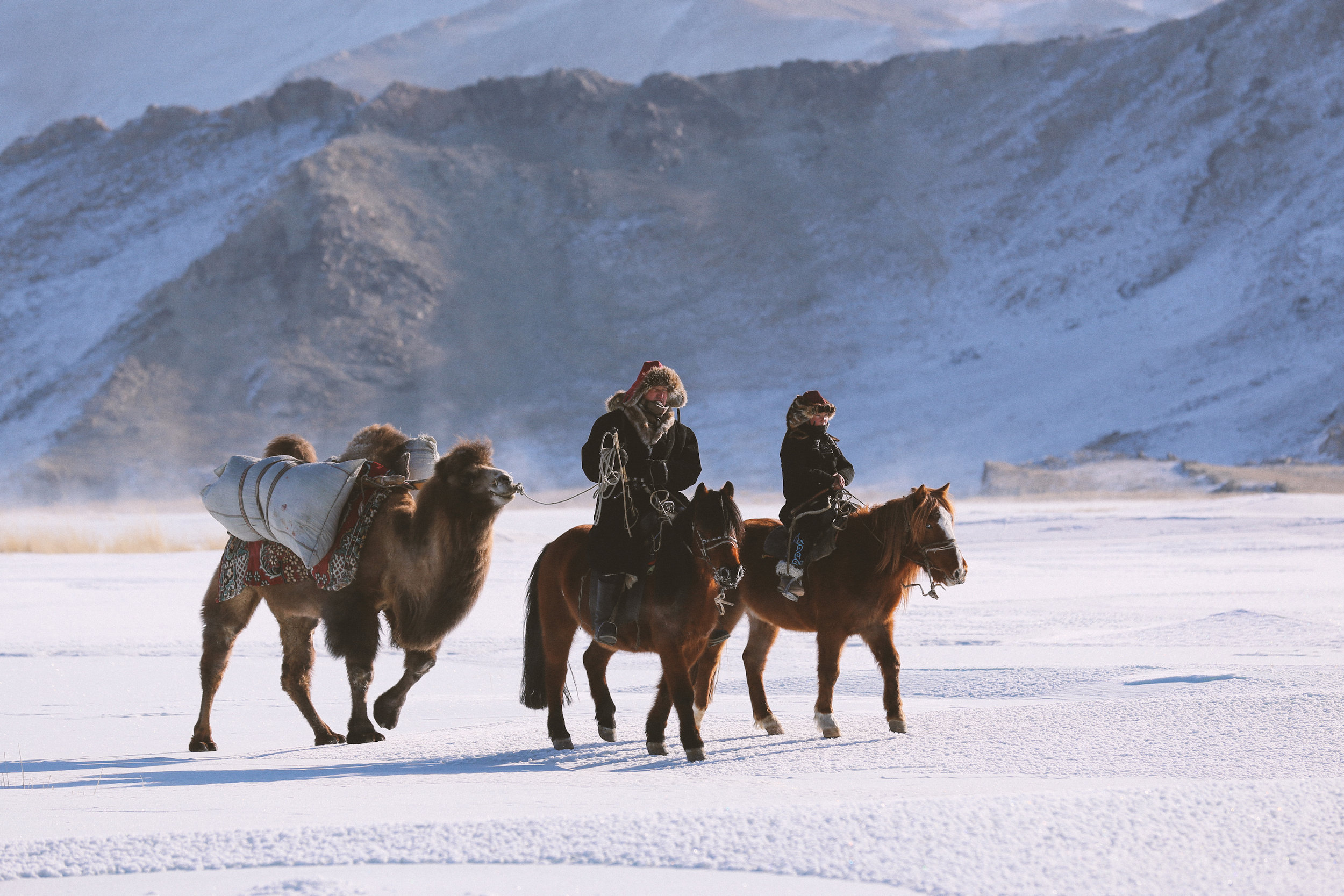 Auez (L) and his son Janibek, starting the winter migration in the Mongolia's Altai Mountains_BOY_NOMAD_Niobe_Thompson.jpg