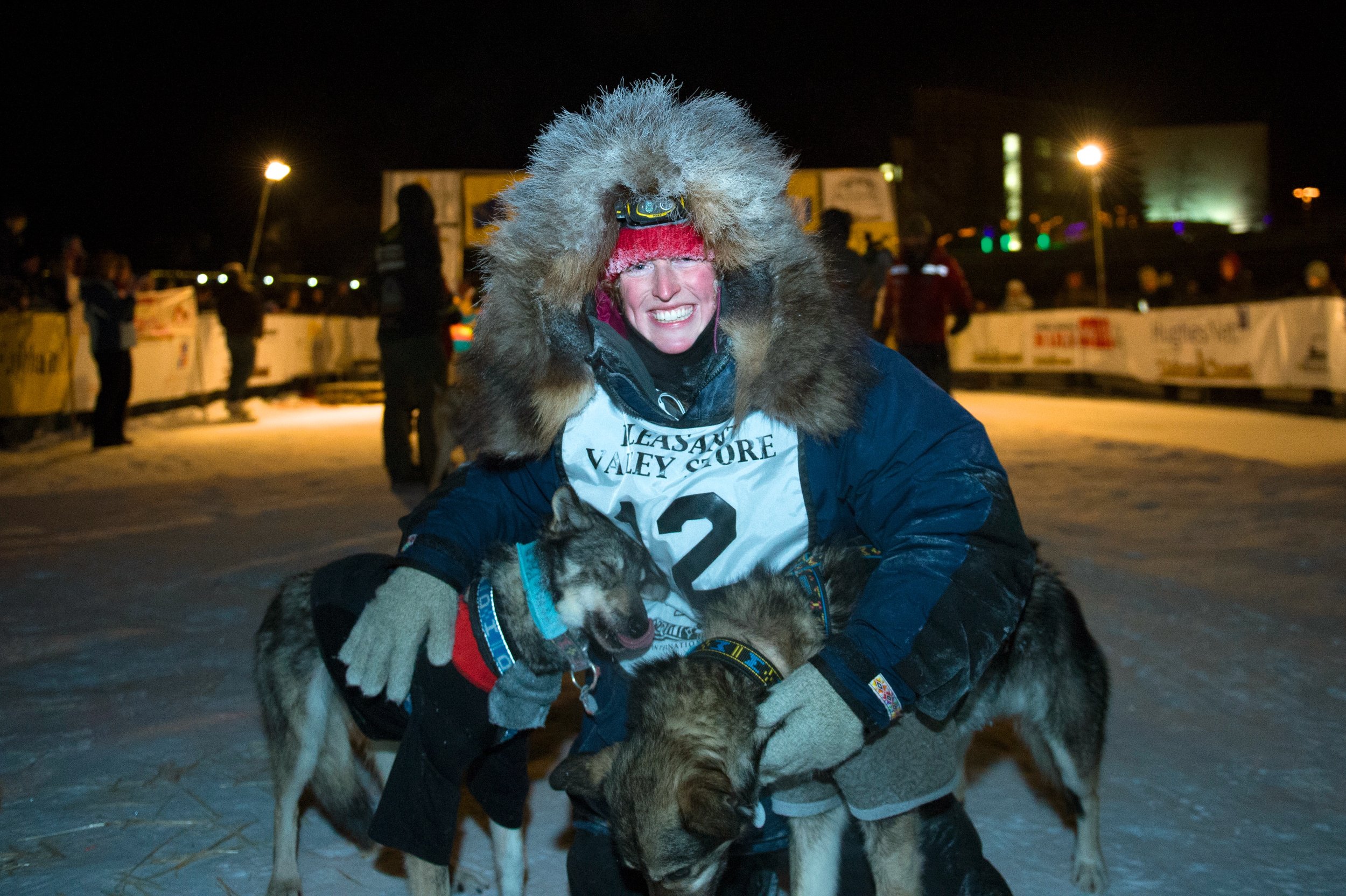 Kristin Knight Pace crosses the finish line in Fairbanks. 