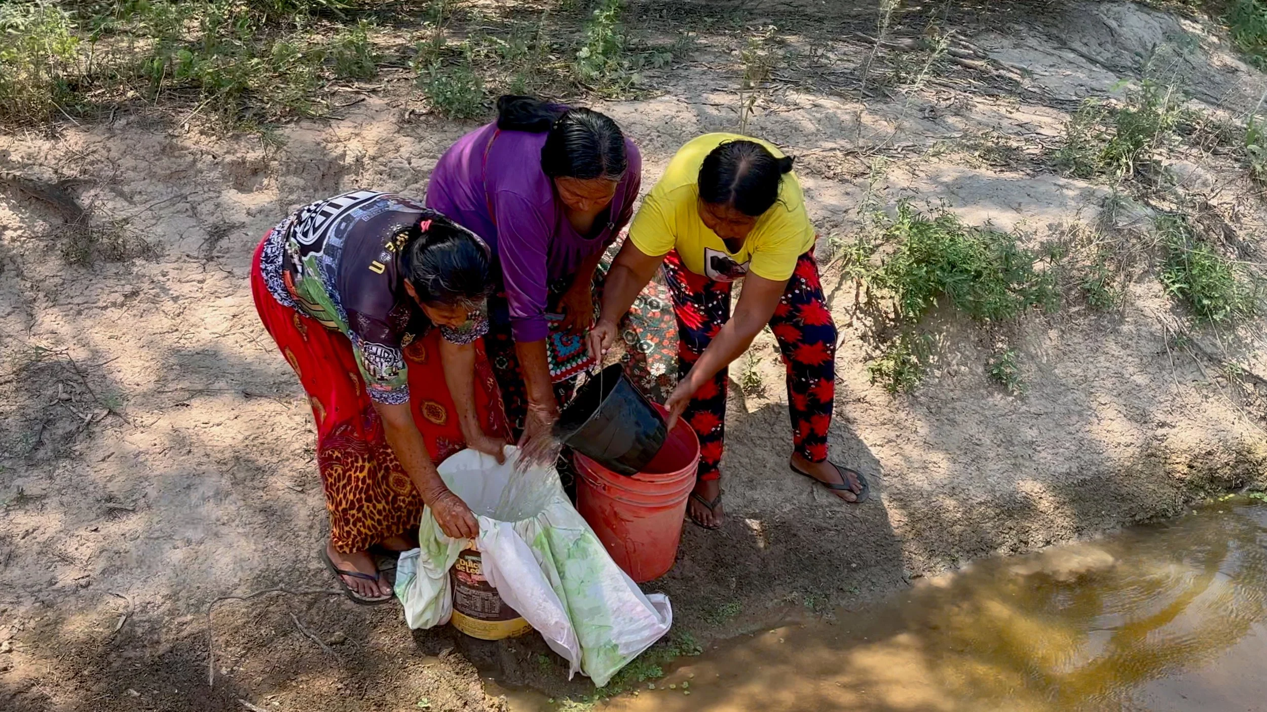 The-Struggle-for-Mother-Water-Women-Fetch-Water-Chaco-Region-Paraguay.jpg