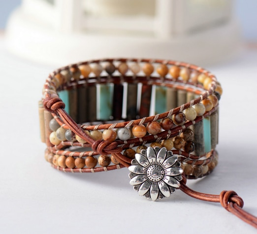 vintage style boho leather wrap bracelet. uses of jasper stone beads grouding gemstones for wealth. positivity stones embrace bracelet gemstones for self love. flower closure. adjustable