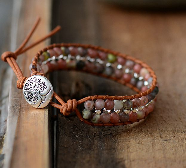 hand tied adjustable leather bohemian cuff bracelet. Rhodonite and mixed grounding positivity stones encouragement jewelry for self-care and gemstones for confidence. adjustable. tree of life closure