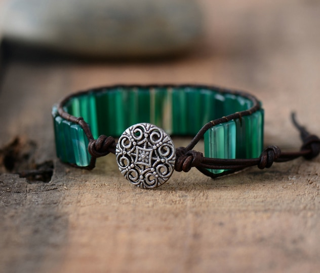 boho cuff bracelet. Healing properties of chakra charging green onyx gemstones for wealth. attract power and money bracelet. genuine dark brown leather hand tied tibetan silver closure adjustable