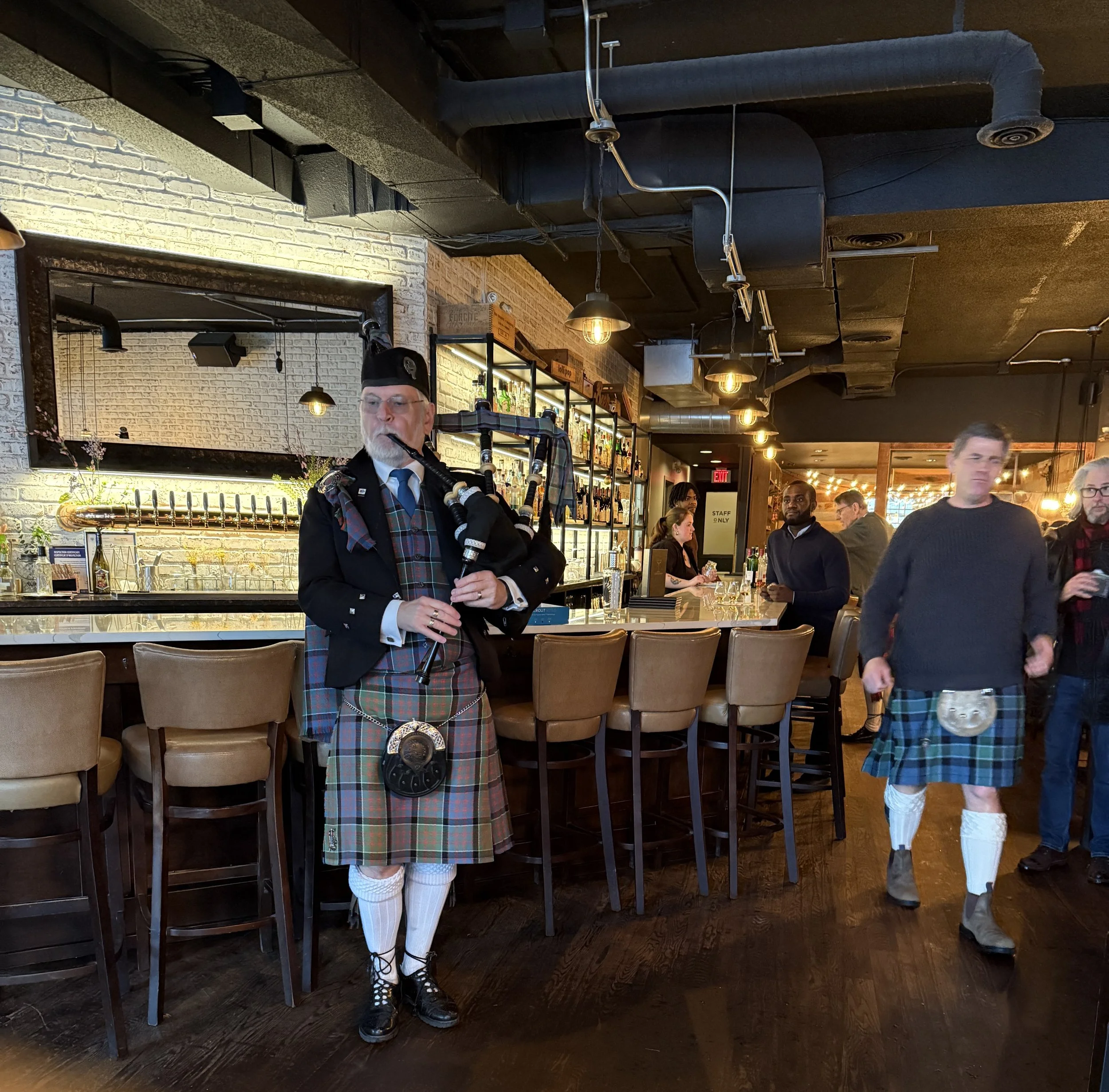 Chair Donald Macdonald piping