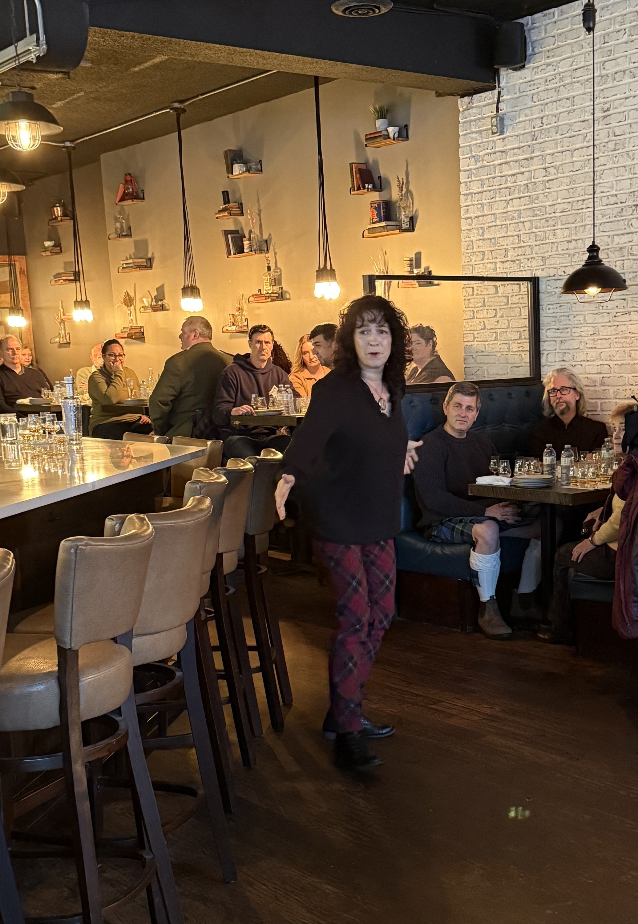 Vice Chair Jen Hill reciting John Barleycorn