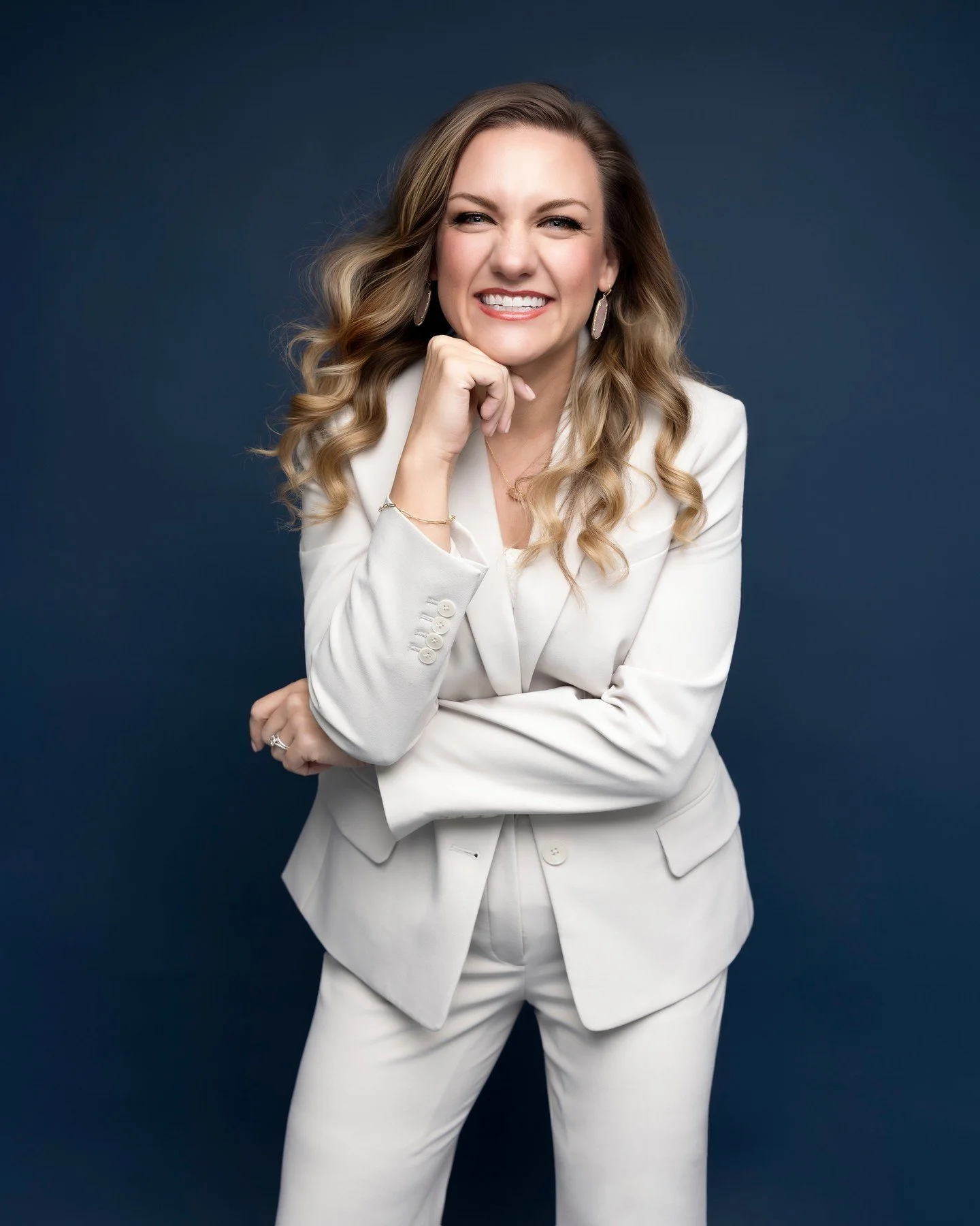 Her last headshot was a crop from a party photo. She's a VP at a bank, a full time mom, and she knew she needed to update it. Life just kept getting in the way. Right? How many of us talk ourselves out of something...and then when we do it, we think.