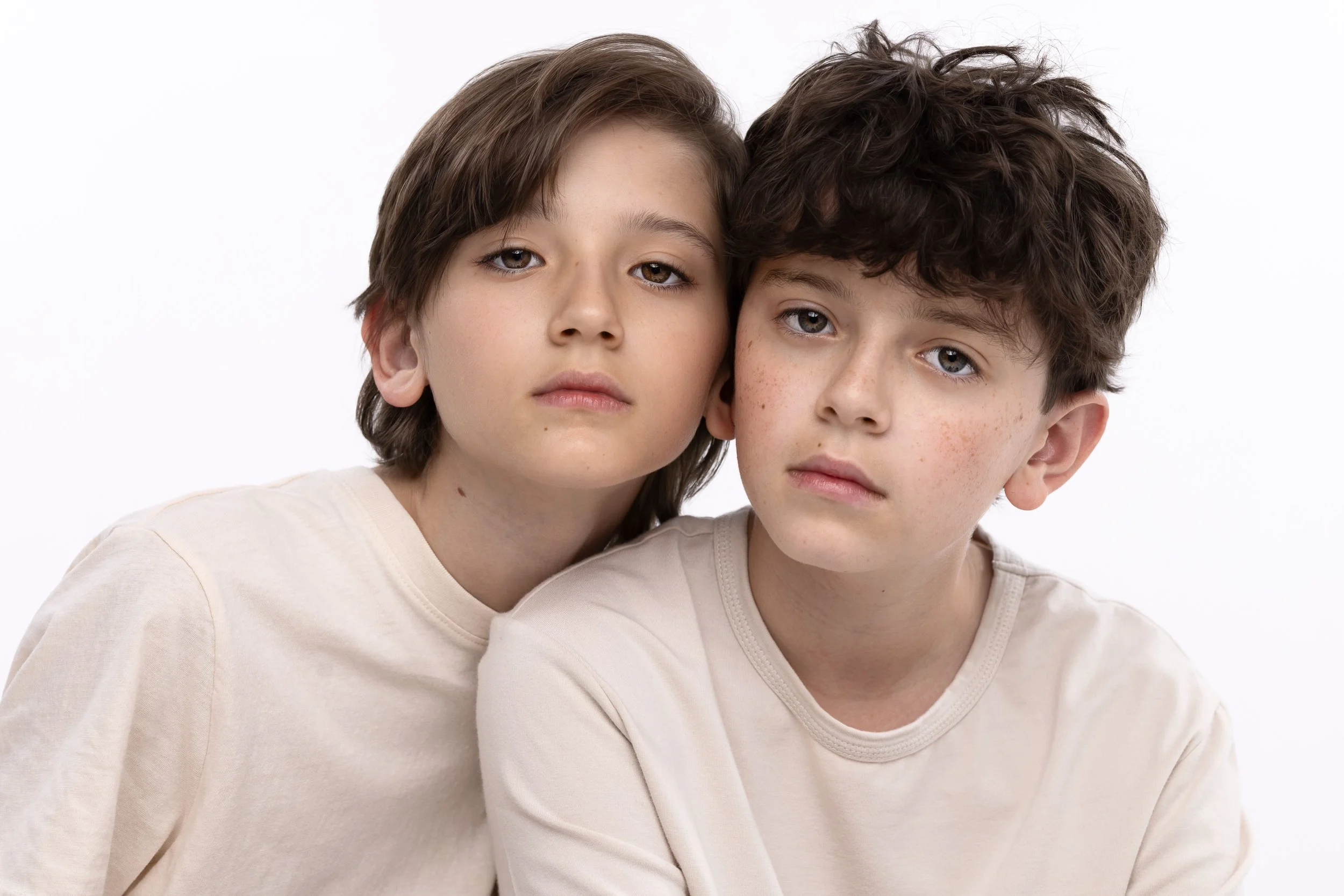 D A R B O &amp;  L U C A

No big smiles. No props. No busy background competing for your attention.

Just two brothers. Best of friends. 

Darbo on the right. Luca on the left.

The freckles. The tousled hair. The way they naturally lean into each ot