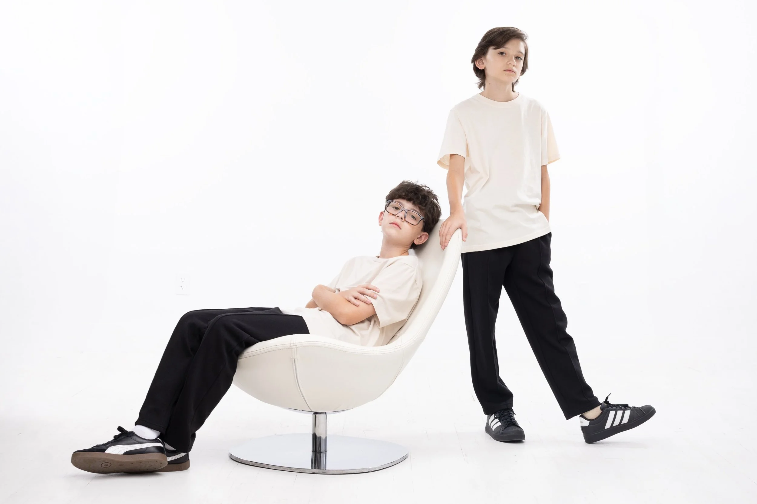 B R O T H E R S

Yesterday, Luca at 11.

Tomorrow, you&rsquo;ll meet Darbo at 13.

But today, the two of them together.

We kept everything minimal and cool. White space, clean lines, black and cream, and two boys who worked pretty hard finding just 